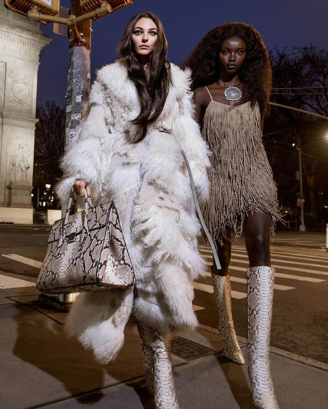 マイケルコースのインスタグラム：「Inspired by New York’s Greenwich Village in the 1970s, the Fall/Winter 2023 #MichaelKorsCollection showcases a luxurious mix of textures in step with the bold spirit of big-city life. Starring @AnokYai and @Vittoria Ceretti, the campaign was shot by renowned duo @InezandVinoodh.    Vittoria and Anok wear Looks 13 and 14 from the Fall/Winter 2023 runway.」