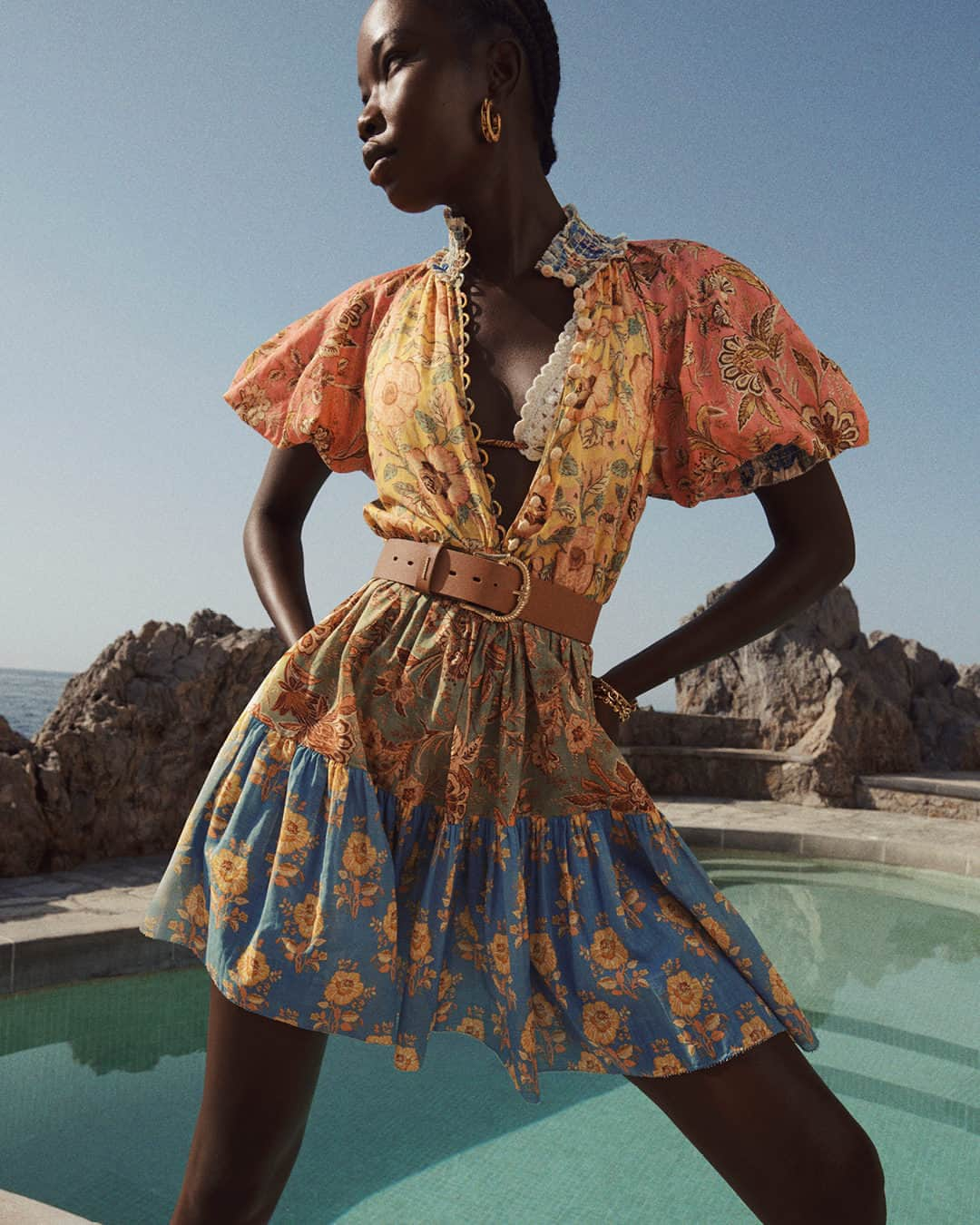 ジマーマンのインスタグラム：「New Arrival: From Resort Swim 24, the Junie Lantern Mini Dress styled with the Twisted Buckle Leather Belt 40, coming soon. #ZimResortSwim24 #zimmermann」