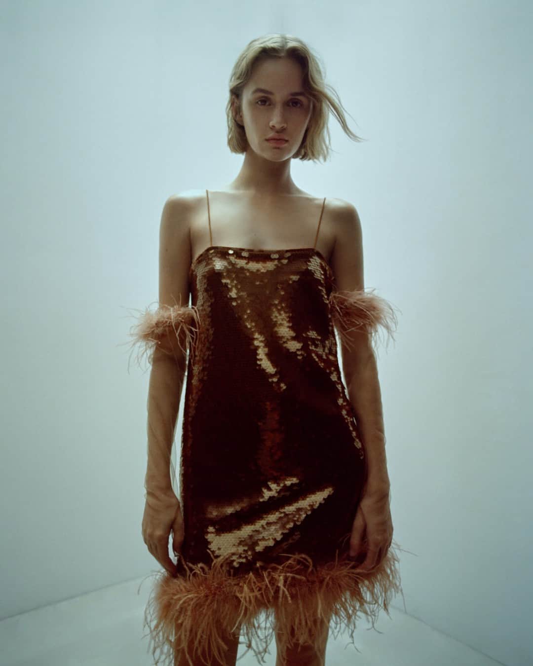 MANGOのインスタグラム：「Time to welcome the new event season with exclusive festive wear. ⁣ Find it in our new limited-edition Capsule pieces, in selected stores and at mango.com. ⁣ Dress: 57029124 & 57019125 ⁣ Gloves: 67010350 ⁣ #MangoWoman」