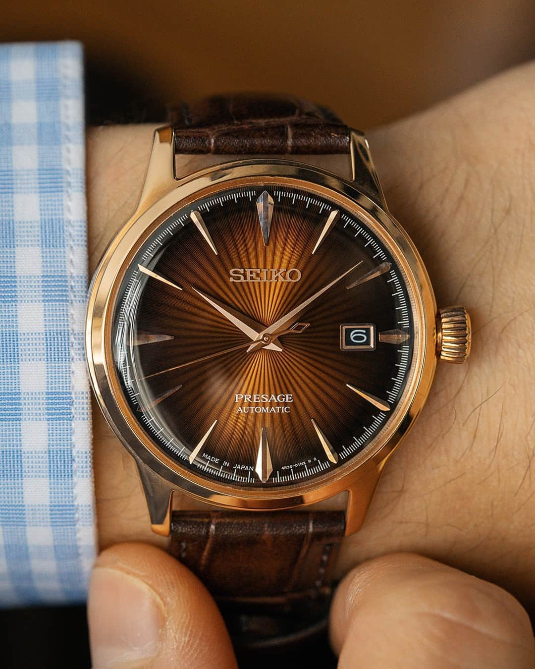 Seiko Watchesのインスタグラム：「Fall for Seiko this Season 🍁 - Accessorize your style with this unique rose gold-finish stainless steel case and stunning brown leather strap. This deep burgundy dial displays a pressed pattern whose shimmering beauty is enhanced by seven layers of gloss finish. Start your holiday season in style, and never second-guess your timepiece choice!  #SRPB46 #Seiko #Presage」