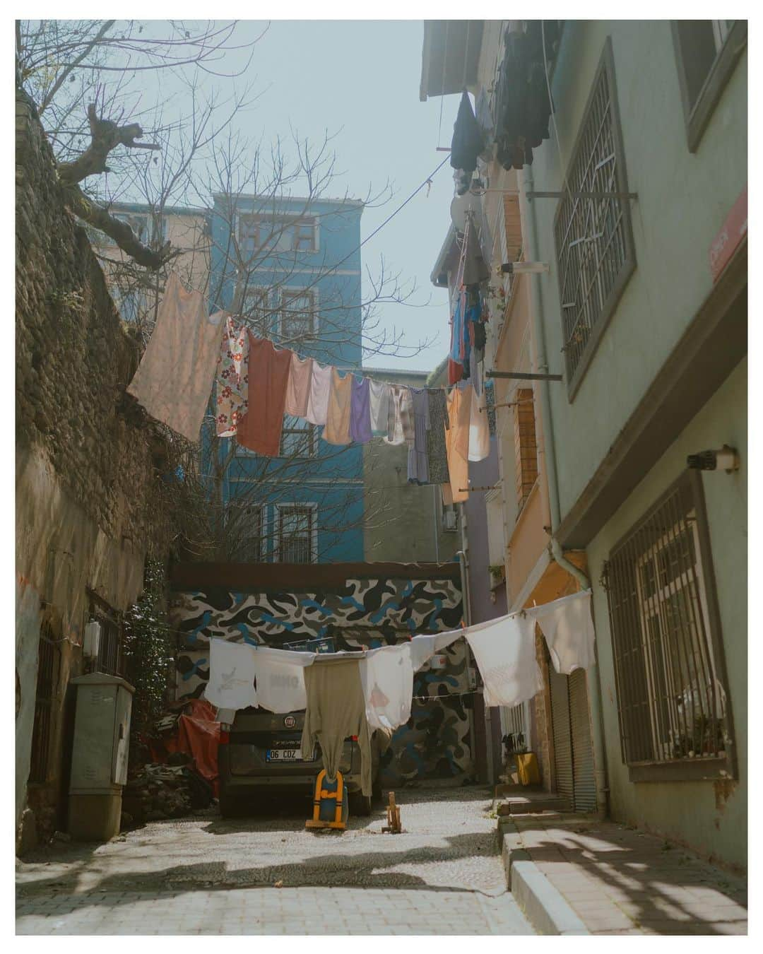 Putri Anindyaさんのインスタグラム写真 - (Putri AnindyaInstagram)「Another series from Balat //   This time is the people from Balat. These are taken in March this year. First one is of course, inspired by @harry_gruyaert and thanks to @misscoolpics who introduced me between worlds photobook ! And the last slide is the postcard picture of Balat, Istanbul. In case you will go there someday, the name of the rooftop cafe : POPSTEL BALAT. Save it for ur next visit!   Anyway, i just love making portraits of strangers. So which one is your favorite?  All taken with #sonya7c with 85mm 1.8 and 35mm 1.4 zeiss.   #streetphotography #balat #istanbul #türkiye #istanbulstreets #streetclassics #timeless_streets #gotürkiye」11月12日 22時07分 - puanindya