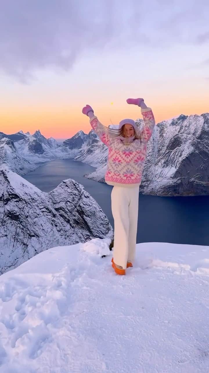 のインスタグラム：「@helenemoo enjoying the beautiful sunsets in Lofoten Islands, Norway 🇳🇴   Lofoten Islands in Norway are a breathtaking archipelago known for their dramatic natural scenery, characterized by towering mountains, deep fjords, and sheltered bays. Located within the Arctic Circle, these islands boast a surprisingly mild climate due to the Gulf Stream, resulting in lush landscapes and rich wildlife, including sea eagles and whales. The traditional fishing villages, with their iconic red rorbuer (fishermen’s cabins), add a charming cultural aspect to the islands. Lofoten is also renowned for its outdoor activities, such as hiking, kayaking, and fishing, and is a favored spot for photographers, especially for capturing the Northern Lights and the Midnight Sun phenomena, offering visitors a unique blend of natural beauty and cultural richness.」