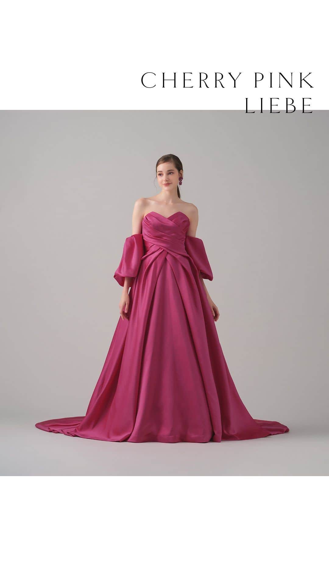 TAKAMI BRIDALのインスタグラム：「［コメント欄に🧡をください！ ］  気になる衣裳を保存しておくと、見返すときにも便利です🕊💕  Cherry Pink Liebe / チェリーピンク・リーベ  とろみのある柔らかなサテンで仕立てたエレガントなチェリーピンクのドレス。  花びらのように角度をつけたネックラインはデコルテがすっきりと美しくエレガントに見えます。  存在感のあるパフスリーブは抜け感を出すためにスリットを入れ、手首にかけてたっぷりと生地をあしらうことで手首の細さが際立ち、腕の細見え効果も。  ※パフスリーブは取り外し可能です。  #takamibridal  #weddingdress  #photowedding  #タカミブライダル #タカミブライダルオリジナル  #ウェディングドレス  #カラードレス #フォトウェディング #プレ花嫁 #チェリーピンクリーベ」