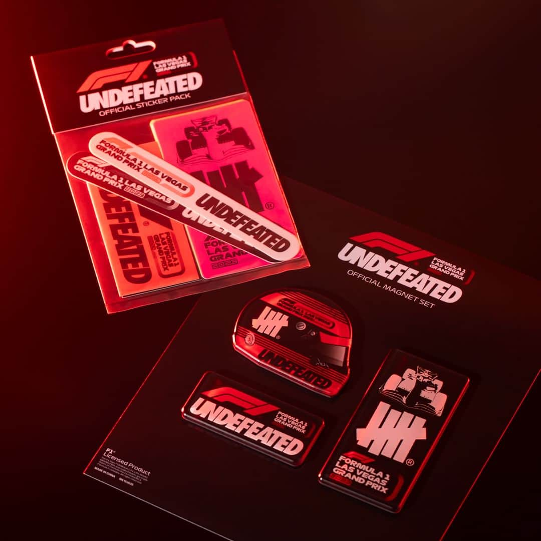 UNDFTDのインスタグラム：「UNDEFEATED x Formula 1 Las Vegas Grand Prix  The UNDEFEATED x F1 LVGP Magnet Set, Sticker Pack and Allover Sunshade.   The Magnet Set is a set of 3 acrylic magnets with printed UNDEFEATED x F1 artwork and a thick acrylic coating, and the Sticker Pack consists of 7 vinyl stickers with laminated and printed UNDEFEATED x F1 artwork. The Allover Sunshade Allover Sun Shade is made of nylon with screen printed UNDEFEATED and F1 logos throughout.  Available Monday, 11/13, at 11am at all UNDEFEATED Chapter Stores and 8am PST at Undefeated.com」