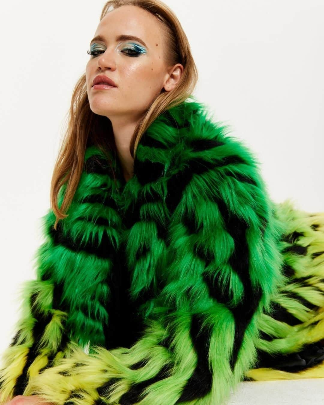 ハウスオブホランドのインスタグラム：「Fashion's wild side just got a splash of neon. Dare to wear? ✨  #houseofholland #aw23 #winterstyle #londonfashion #autumnseason #coatstyle #furcoat #maximalistfashion」