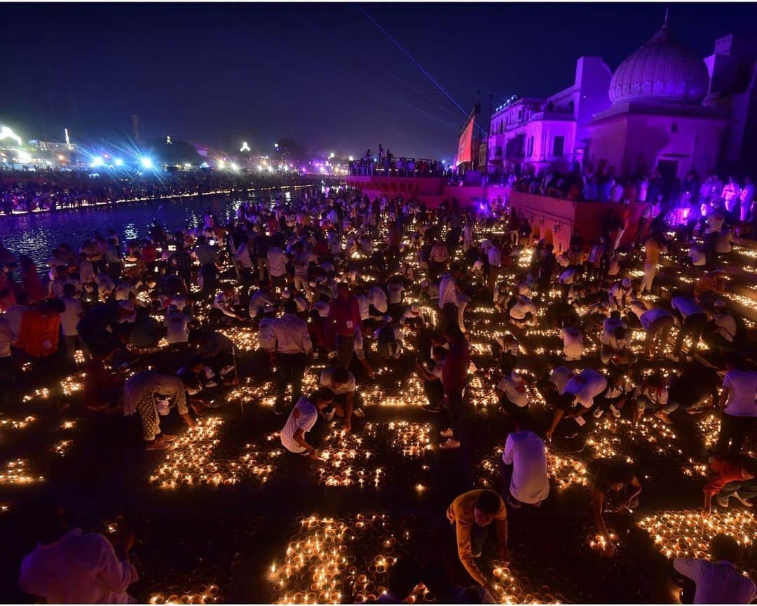 AFP通信さんのインスタグラム写真 - (AFP通信Instagram)「Diwali is celebrating by millions people around the world. The festival of lights marks the Hindu new year and the end of summer.⁣ ⁣ 1 - Earthen oil lamps are placed over the rangoli, a decorative design, on the occasion of the Hindu festival of Diwali, in New Delhi.⁣ ⁣ 2 & 3 - Hindu devotees light earthen lamps on the banks of the Sarayu River on the eve of Diwali in Ayodhya.⁣ ⁣ 4 - Sikh devotees light oil lamps on the occasion of Diwali festival at the illuminated Golden Temple in Amritsar.⁣ ⁣ 5 - A woman places earthen oil lamps on the occasion of Diwali in New Delhi.⁣ ⁣ 6 - A house is illuminated with lights on the occasion of Diwali in New Delhi.⁣ ⁣ 7 - A Hindu priest offers prayers during the celebrations to mark Diwali at a temple in Colombo. ⁣ ⁣ 8 - A Hindu devotee offers prayers during the celebrations to mark Diwali at a temple in Colombo.⁣ ⁣ 9 - Students light earthen oil lamps on the occasion of the Diwali in Guwahati.⁣ ⁣ 10 - Fireworks light up the night sky during Diwali in Mumbai.⁣ ⁣ 📷 Biju BORO ⁣ 📷 @sajjadafp⁣ 📷 @sanjaykanojia07⁣ 📷 Ishara S. KODIKARA ⁣ 📷 @indrapix⁣ 📷 @narindernanu⁣ ⁣ #AFPPhoto」11月13日 21時01分 - afpphoto