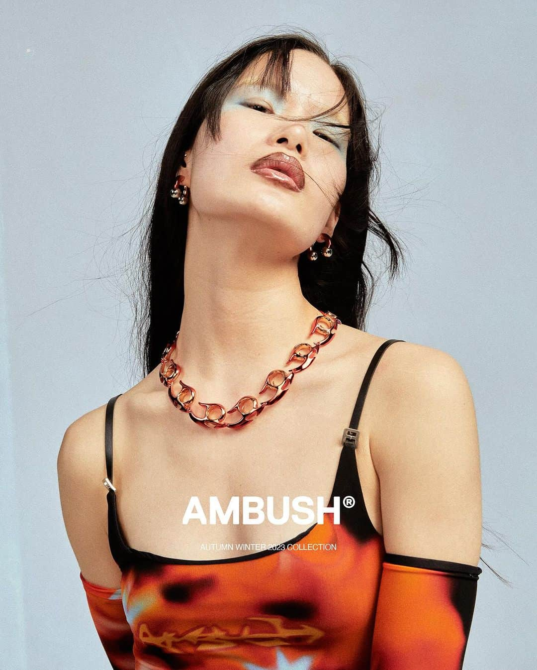 AMBUSHのインスタグラム：「Our fiercest jewelry styles in FIRE RED, styled with the flame-inspired seasonal graphic on #AMBUSH AW23 apparel.   Now available at our WEBSHOP and WORKSHOP.」