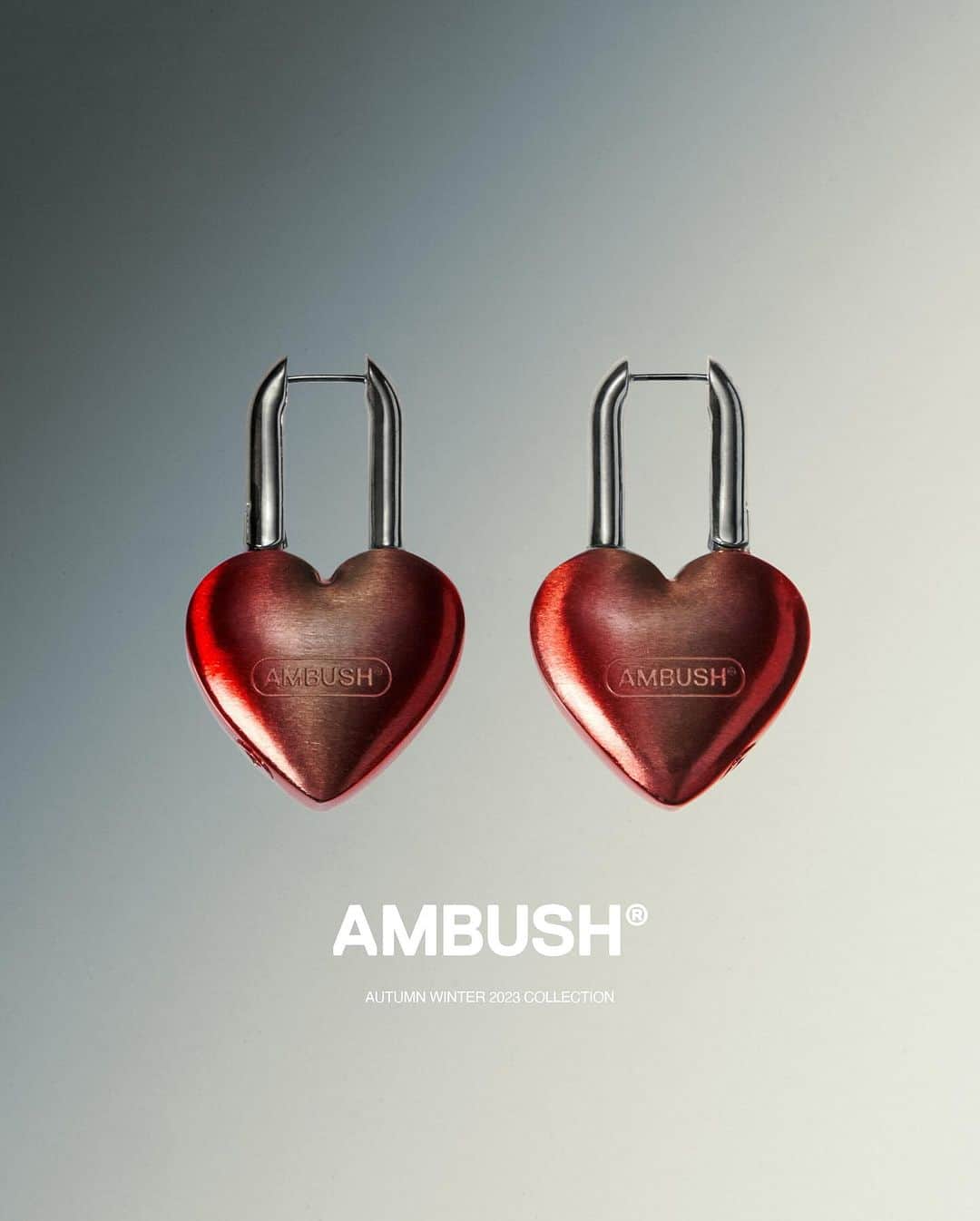 AMBUSHのインスタグラム：「#AMBUSH HEART PADLOCK EARRINGS. A classic icon of the brand with engraved logo, hinging closures, and keyhole detail.   Now in a larger size, available at our WEBSHOP and WORKSHOP.」