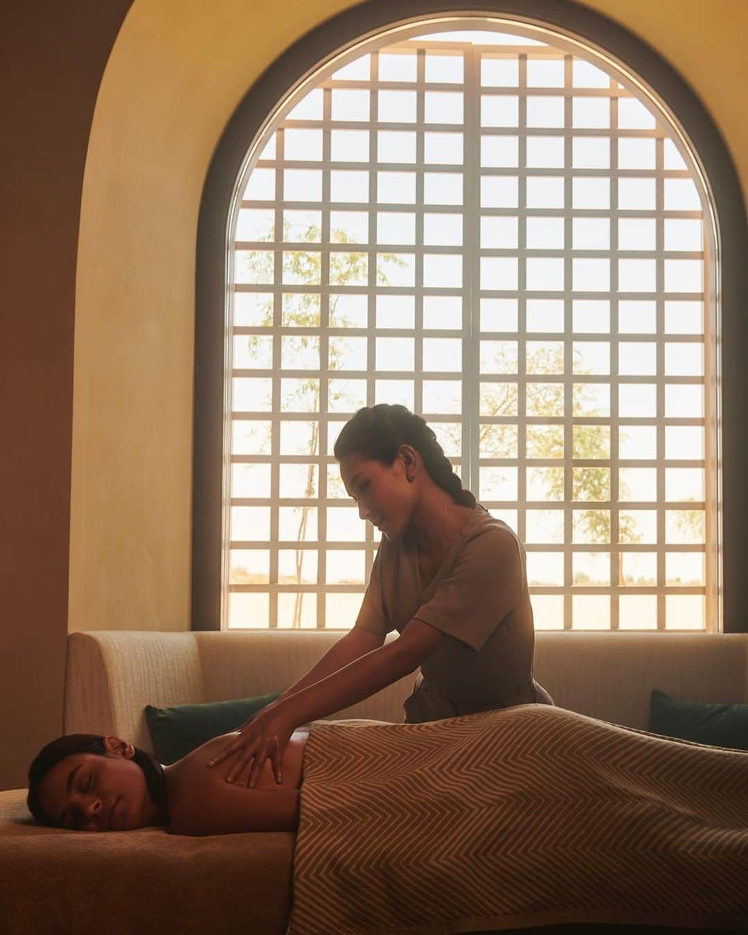 バンフォードのインスタグラム：「Embark on a holistic wellness journey with Bamford and Bab Al Shams Desert Resort: nestled within the tranquil golden sandscape, the Spa and Hammam offers an oasis of serenity that embodies a profound commitment to holistic wellness.  Inspired by the rich traditions of Arabian healing, the luxurious Bab Al Shams spa experience features a curated edit of signature Bamford body treatments, facials, and spa days.   Amongst the desert palms, guests are invited to unwind and disconnect from the outside world in the sauna, hammam complimented by a peaceful courtyard adorned with a tranquil plunge pool to restore balance and clarity.  Adventure awaits...  #bamford #bamfordspa #babalshams #wellness #spa」