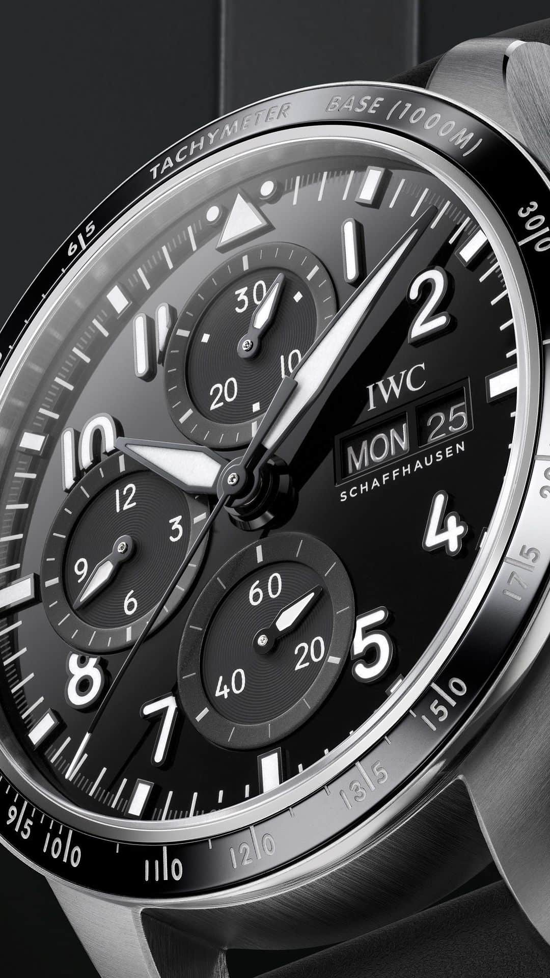 IWCのインスタグラム：「Uncompromising performance, unparalleled style.   The intricate all-black dial on the Pilot’s Watch Performance Chronograph 41 AMG (Ref. IW388304) requires a technically complex production process. A grade 5 titanium alloy case houses the IWC-manufactured 69385 calibre movement, which has been engineered with an unyielding focus on robustness, reliability and precision.  #PerformanceChronograph I #AMGxIWC I #TheReference」