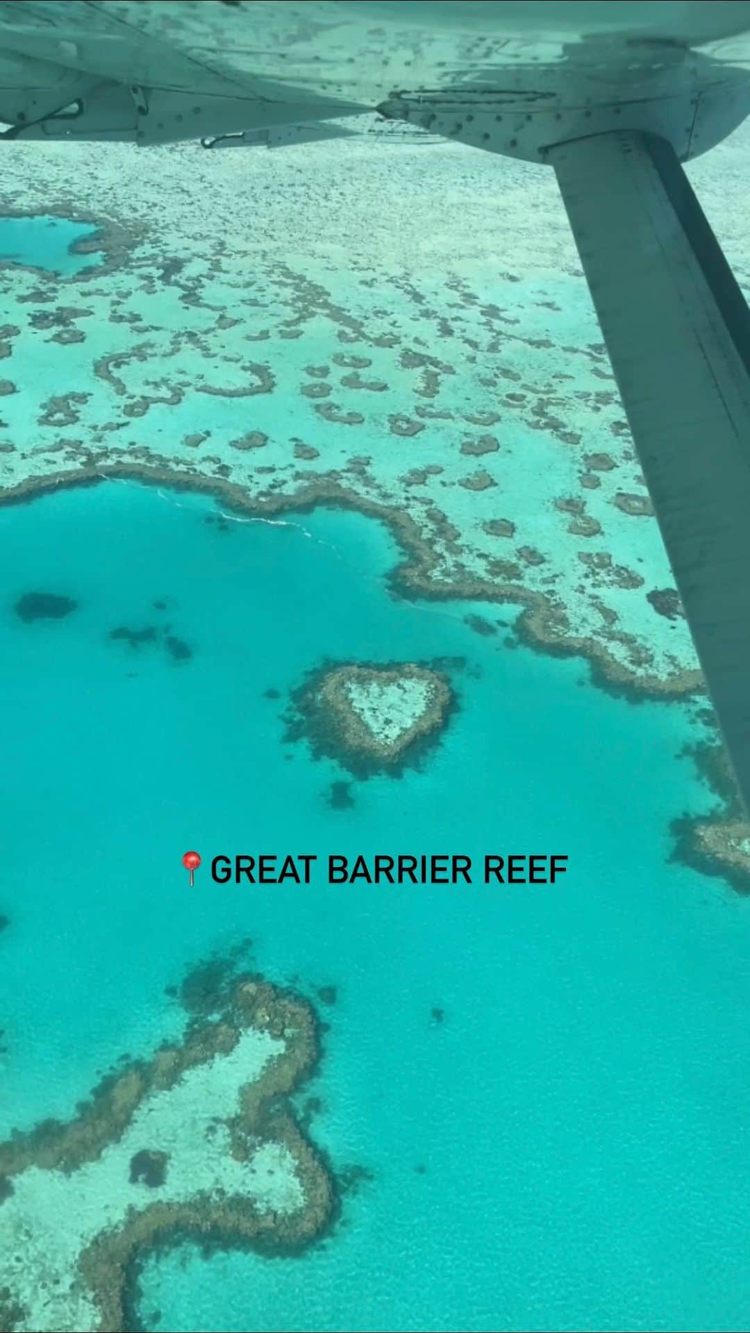 Lonely Planetのインスタグラム：「“Snorkeling or diving is a bucket-list item at the Great Barrier Reef (for good reason!) but it’s so peaceful and relaxing seeing the ocean dotted with reefs from above,” says LP staffer @deepa, who took a break from boats with this scenic flight over Queensland’s coast ✈️🌊  Bonus: you won’t get seasick 😅 “If you’re traveling to the Whitsundays or Cairns, pack precautionary motion sickness meds if you’re spending time on the water,” she adds. “I don’t usually feel queasy, but Australia’s waves are no joke.”」