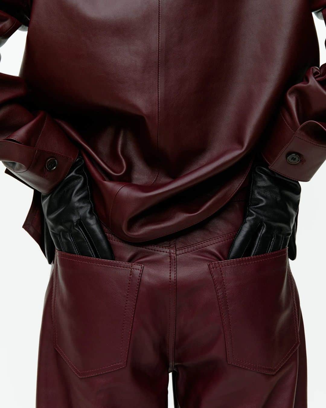ARKETのインスタグラム：「This burgundy leather set includes a boxy shirt and wide fit trousers in chrome-free leather. Explore all of our newest pieces: link in bio. - #ARKET」