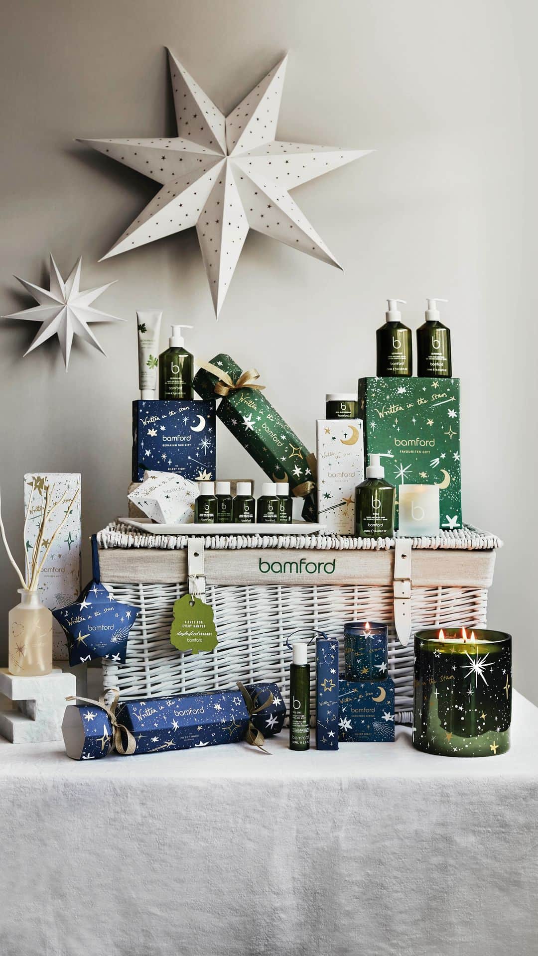 のインスタグラム：「There’s nothing quite like finding a Bamford hamper under the tree this Christmas🎄   Our limited edition Complete Christmas Hamper features a curated edit of products from our Christmas Collection. Each product is wrapped beautifully in recycled packaging adorned with intricate illustrations of the night sky in celebration of our founding source of inspiration: nature.   Discover our signature and limited edition hampers in-store and online via the link in bio 💫  #bamford #christmas #christmashampers #limitededition #christmasgifts #hampers #giftideas」