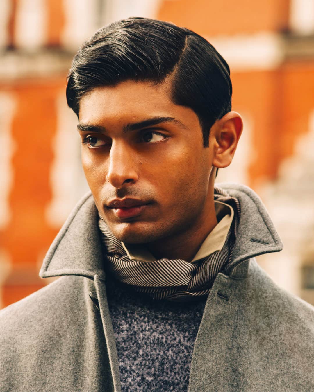 のインスタグラム：「Casual elegance for the festive season and gifting ideas reimagined by dunhill in-store and online at dunhill.com   @pratiksshetty wears dunhill’s lambswool crewneck jumper over our cotton-cashmere Western shirt, artfully finished with our tissue-cashmere scarf.  Photographed by Robbie Lawrence (@robbiel1) and styled by @stuartvwilliamson.」