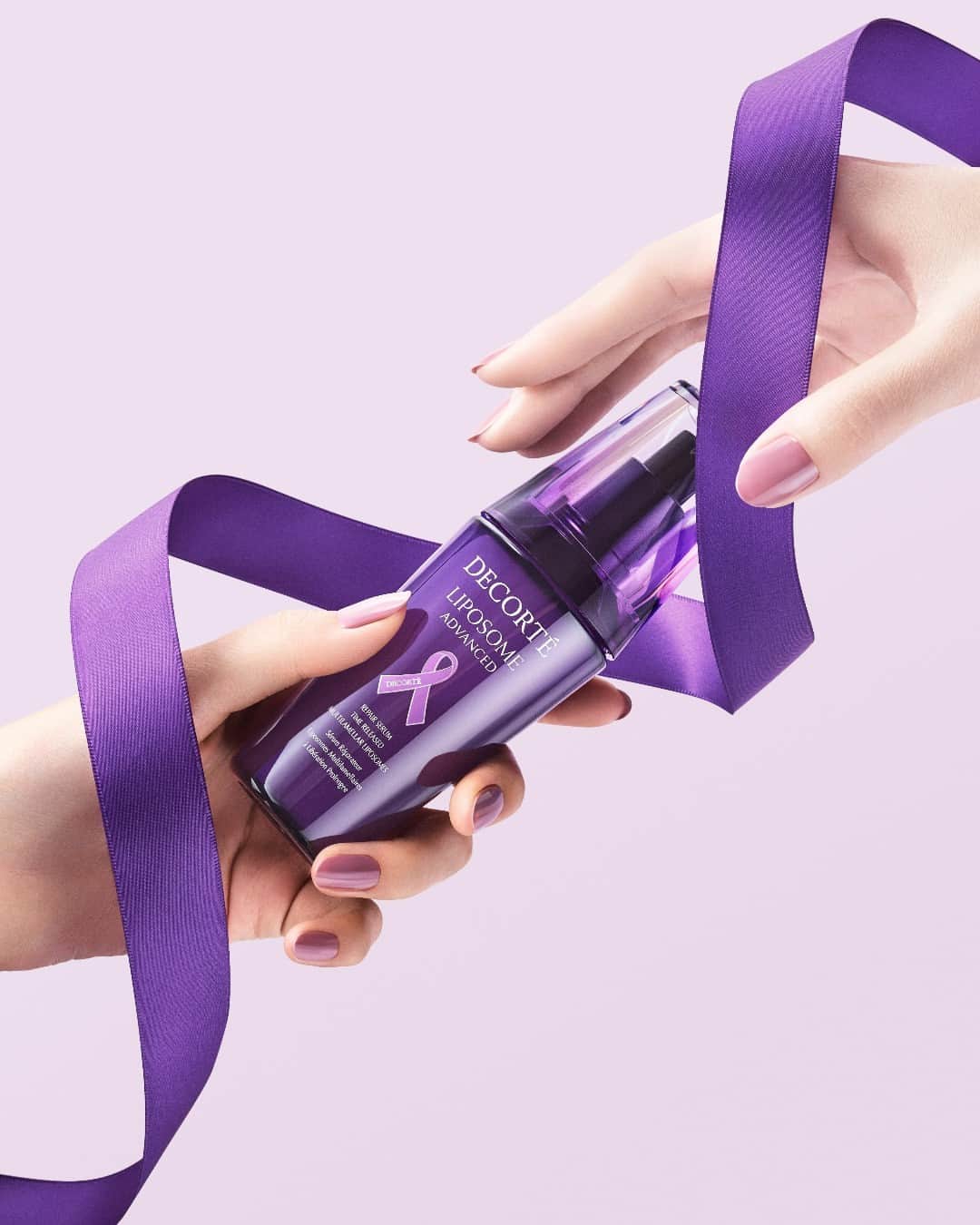 DECORTÉのインスタグラム：「Experience the Liposome Advanced Ritual — and help make a difference. Your purchase of the limited-edition Purple Ribbon Set includes a donation to Win to help support the movement to eliminate violence against women. #PurpleRibbonProject」