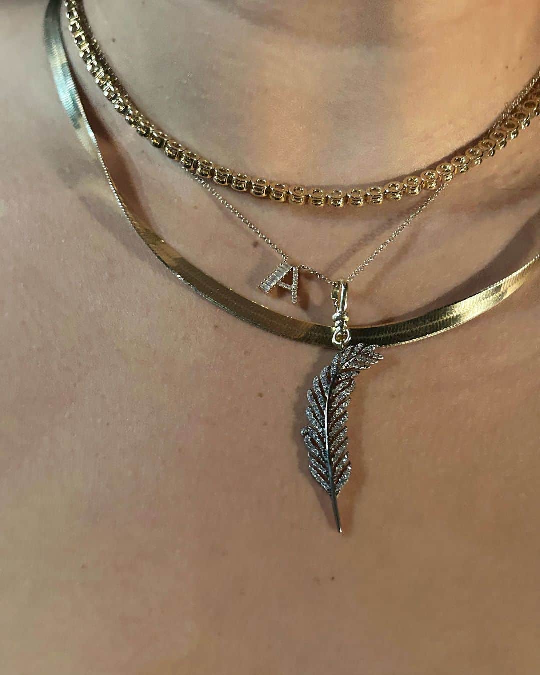 ルル フロストのインスタグラム：「A favorite piece in the Charm'd by Lulu Frost collection, our 10K white gold Feather Light Charm is created with an antique-inspired gunmetal finish that calls to mind Georgian and Victorian estate jewelry pieces. The beautiful pavé diamond feather is placed upright, symbolizing protection and guidance while serving as a reminder that you're on the right path. Let our Feather Light charm uplift you or a loved one as you choose which Charm'd by Lulu Frost symbols are most meaningful to you.💖#charmdbyLF #lulufrost」
