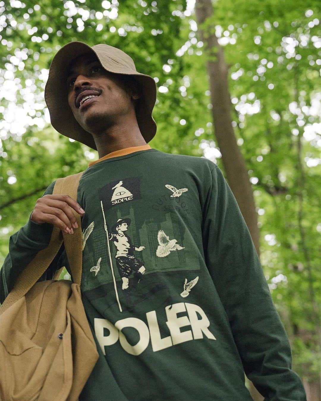 Poler Outdoor Stuffのインスタグラム：「Inviting you all to step into the Orchard Street Lodge and immerse yourself in the perfect fusion of urban style and outdoor spirit! 🌿 Our collaboration with STAPLE brings you vintage graphics inspired by camp vibes, reimagined right in STAPLE’s NYC backyard.  Get ready to elevate your next adventure, whether it’s a spontaneous trip down the block or an epic journey into the great outdoors.   Shop the full collection at poler.com  #flockwithcampvibes」