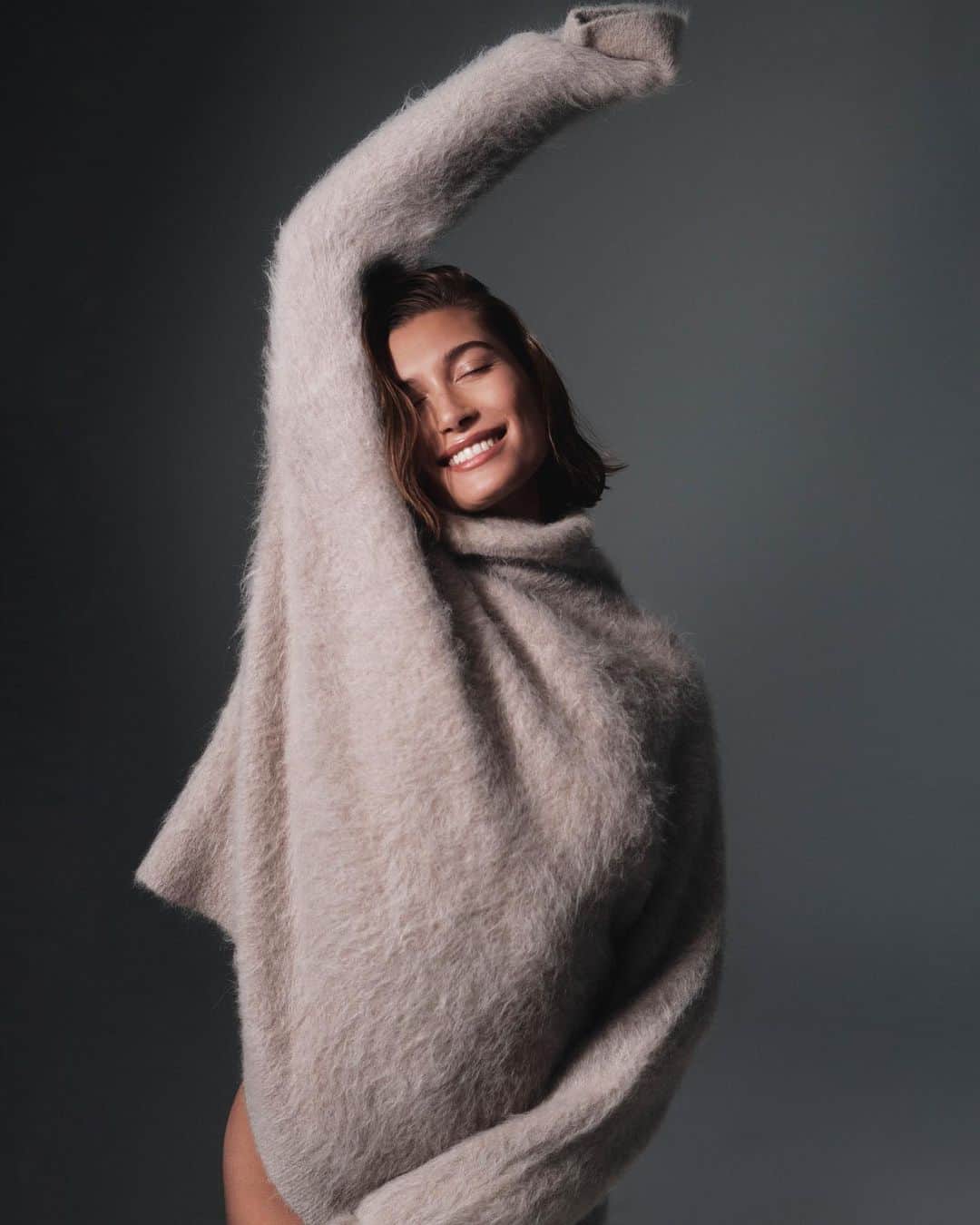 Calvin Kleinのインスタグラム：「Feel the season. @haileybieber cozies up in the Brushed Alpaca Funnel Sweater.​  Discover the holiday collection on CalvinKlein.com」