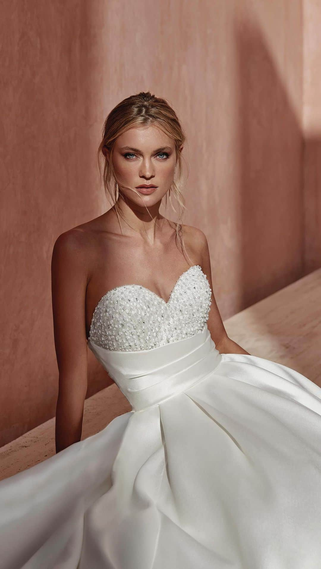 Pronoviasのインスタグラム：「Turn heads and steal hearts in our exclusive #Pronovias 2024 collection💛  Discover the styles at your nearest store. Book your appointment, link in bio🔗  Dresses: Landon, Roman, Antalya, Luisa, Nihi」