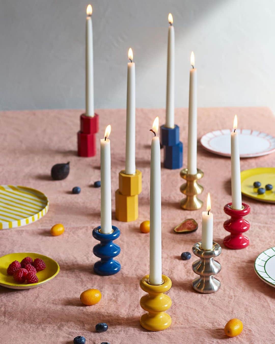 Design Milkのインスタグラム：「Bring some warmth + playfulness into your space with @eldvarm's latest candleholder collection. 🕯✨  Created by CEO of @eldvarm Louise Varre + designer @charles_kalpakian, each design is inspired by our primal connection to fire + the environment. 🔥 With their unique designs + vibrant colors, you easily can mix + match for a harmonious display. \\\ Head to the link in bio to see more. 🔗  Photography by @fotografhelenpe; Styled by @ullstranddesign.」