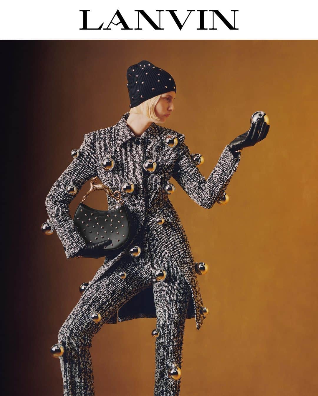 ランバンのインスタグラム：「LANVIN Holiday 2023: Light, shadow, magic   Delve into the holiday festivities with a selection of essential pieces embellished with polka-dot studs.    Campaign photographed by @theodegueltzl   #LANVINHOLIDAY2023 #LANVIN」