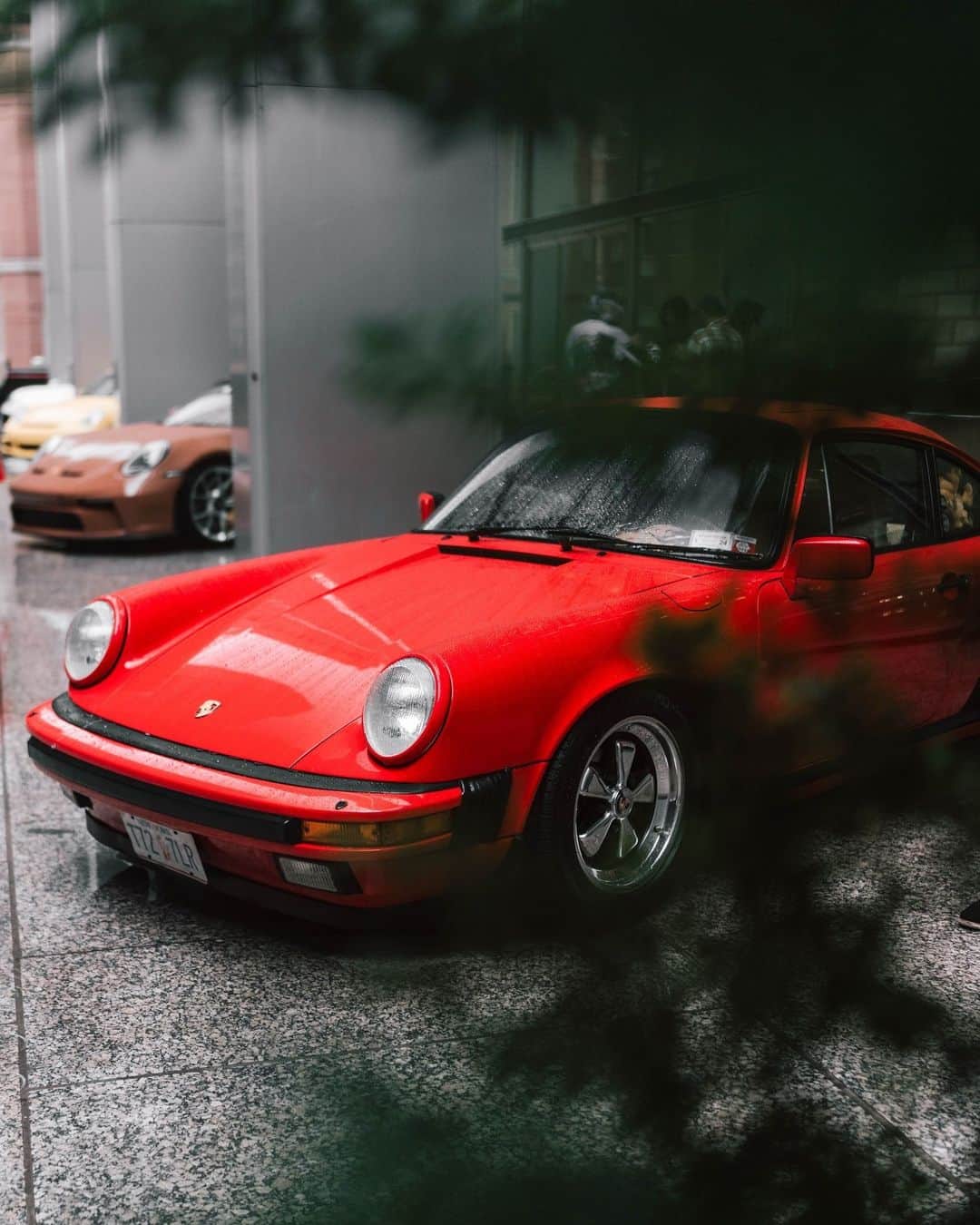 Porscheのインスタグラム：「Guards Red is more than just a colour. ❤️  It encapsulates the history of Porsche. Discover how New York based barber Richard Mendoza got his hands on his dream car, in his dream shade, at the link in our bio.」