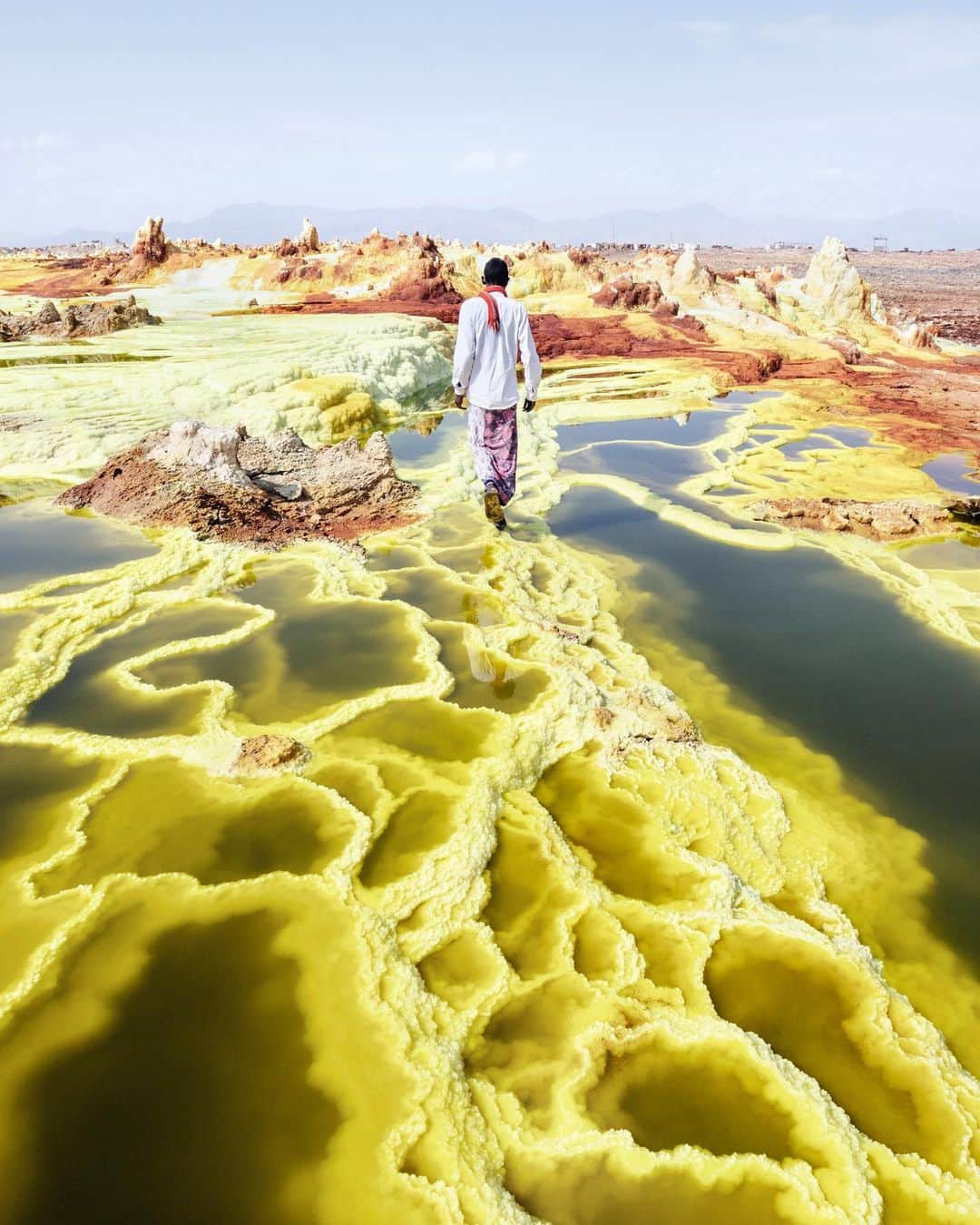 thephotosocietyのインスタグラム：「Photos by @andrea_frazzetta // Located in northern Ethiopia’s Afar Triangle, the Danakil Depression is where three tectonic plates meet. This vast plain is the homeland of the Afar nomads, who live off extracting minerals, namely salt, in one of the most inhospitable places on Earth. Follow @andrea_frazzetta for more images and stories. #Africa #Ethiopia #Danakil」