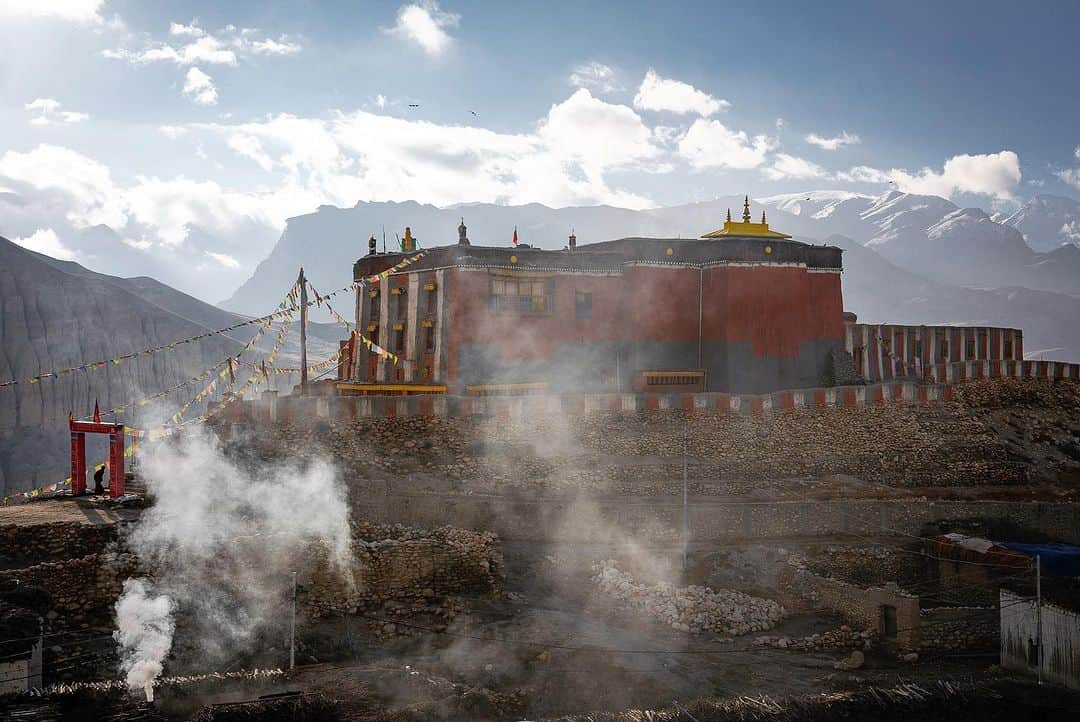 Cory Richardsさんのインスタグラム写真 - (Cory RichardsInstagram)「Words by Ben Ayers @jetbutterflies // In the wide desert of Upper Mustang, the road planes along canyon walls and dry mountainsides dotted with hundreds of unspeakably ancient human-made caves. The light plays a slow game of chase with the shadows cast by the highest mountains on the planet, now behind us. We sweep the corners wide, drawn to cliff-edges teetering above the braided Kali Gandaki River below. We don’t know where to look – the road, the layers of tortured mountains, or the sand-castle parapets of rock and mud towering above us.   Instead, we watch the oncoming frame-bent jeeps as they roaring around the blind corners on bald tires. In Tsarang, the drivers share a rough kindness with us. We play snooker, a game we don’t know. Cory tries and fails to find a tutorial on YouTube. Nursing warm cans of beer, we realize the drivers don’t know how to play either.   The evening passes in one long, impossible game of scratches and flubs until the young man running the hall flicks the light switch and kicks us out into the cold, thin air of a star-streaked night.  @vacheronconstantin」11月17日 3時42分 - coryrichards