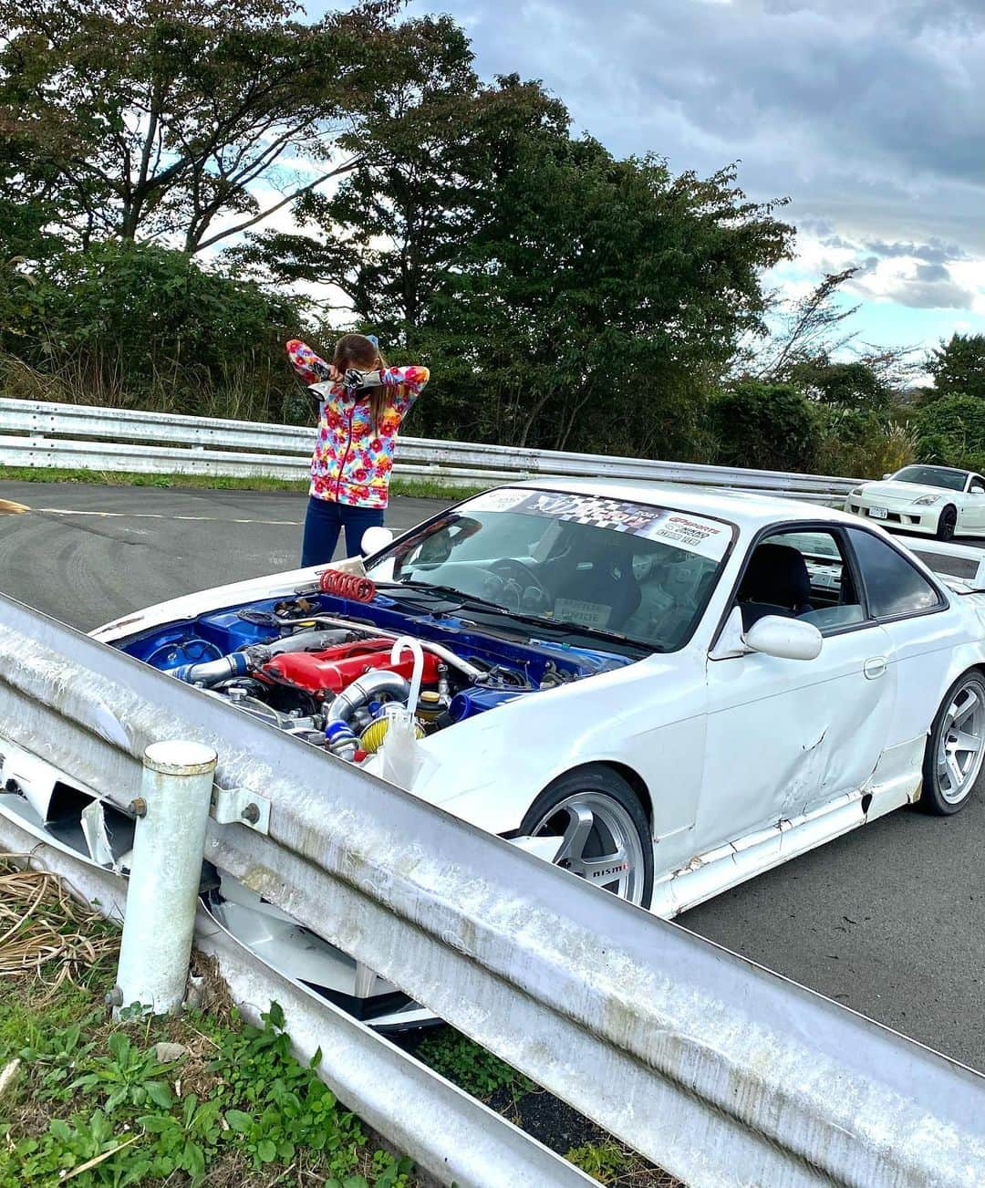 下田紗弥加のインスタグラム：「. My practice machine is back after a year and a half  However, the suspension suddenly broke, →The car bounced three times and became uncontrollable. →The accelerator pedal was stuck behind the brake pedal! →The more I pressed the brake, the more the accelerator was pushed in at the same time. In the end, it hit the guardrail!  Check out my YouTube episode of Autopolis!  1年半越しに復活したスクール号くん..😇  いきなり足が折れる！ →車が3バウンド制御不能‼︎ →ブレーキペダルの裏にアクセルペダルがめり込む‼︎! →ブレーキ踏むほどアクセル全開‼︎‼︎ 結果: ガードレールさんこにょにょちは😙❤️  続きはD1GPオートポリスの YouTubeを見てくだせぇええぇ🎥‼︎  🔎【drifting sayaka】  #silvias14 #driftgirl #cardrifting」