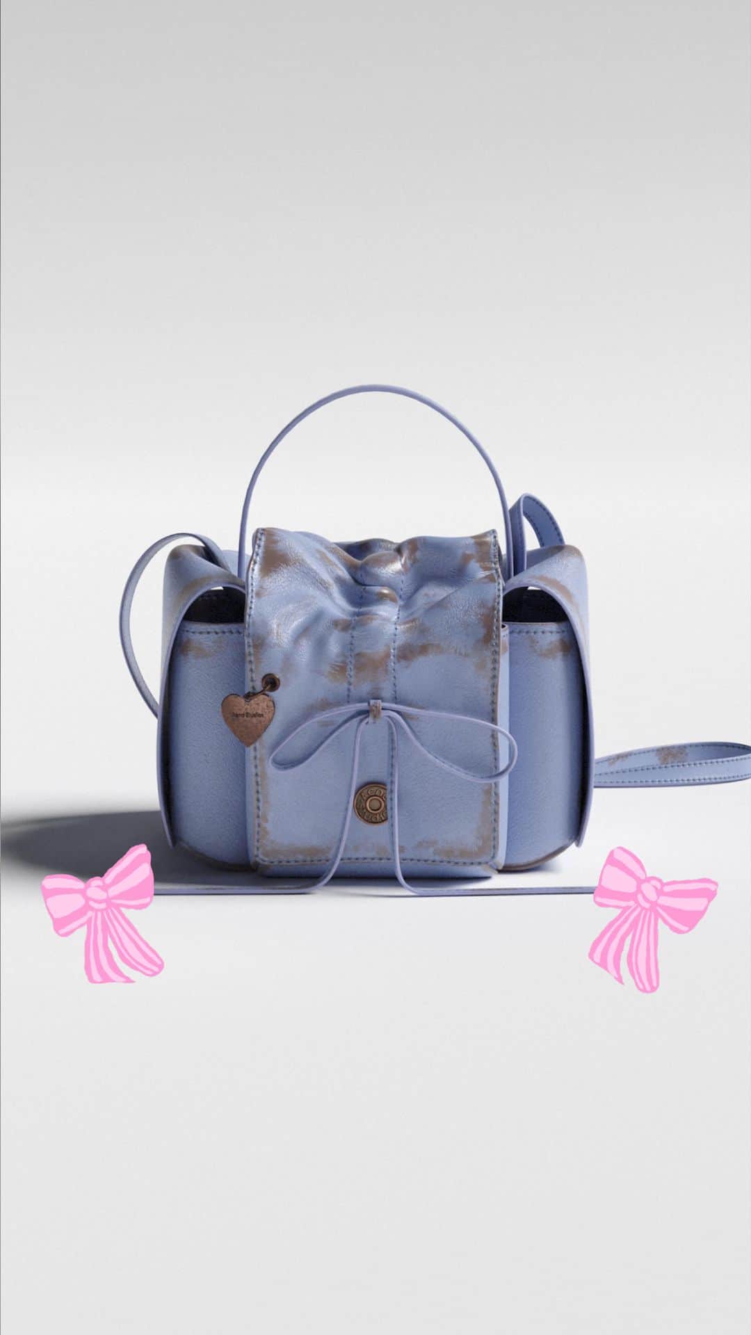 Acne Studiosのインスタグラム：「Our Multipocket mini bag in icy blue. 🎀 Discover perfect #AcneStudios gifts for this holiday season.」
