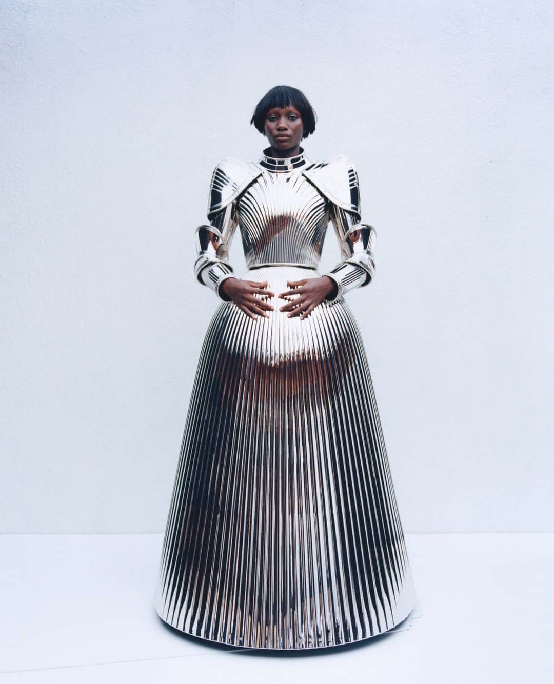 i-Dのインスタグラム：「Demna's latest @balenciaga couture collection continued exploring some of his perennial themes — razor-sharp nods to Cristóbal Balenciaga’s jutting volumes, floorsweeping gowns quivering with feathers, trompe l’oeil jeans a result of hand-painting, as well as windswept clothing moulded as if to defy gravity and archetypal black- tie and casual garments reimagined in dramatic volumes and elaborate textures.⁠ ⁠ “Making clothes is my armour,” he said after the show. “Cristóbal used to say his métier was his armour — and [clothes] are the place where I reconnect with myself.”⁠ ⁠ “How do you make couture modern?” one journalist asked, to which he replied: “You just saw.”⁠ ⁠ But really, the answer is more complex than the surface belies. “We have a tendency, especially working in this business, to always want to modernise things,” he reflects in a new interview with i-D. “Does it need modernising? If art could exist in the context of fashion, I think it would be couture.”⁠ ⁠ Hit the link in bio to read more from #Demna on Balenciaga's rebellion against 'luxury'.⁠ .⁠ .⁠ .⁠ Text @osman_ahmed_⁠ Photography @stef_mitchell⁠ Fashion @sydneyrosethomas⁠ Hair @akemi_kishida at MA+⁠ Make-up @karinwesterlundd at Streeters⁠ Set Design Anne Aubert⁠ Casting Gabrielle Lawrence at @peoplefile⁠ Models Anne Kroon at Known, Sweia Hartmann, Mami Akol and Ash Rouault at Select, Deborah Akanni at Oui, Mortiz Wöhlbier, Seng Khan at Women, Kamil Sznajder at Aquamarine, Piotr Szatan at The Squad, Guo Jike at RockMen, Maguatte Thiam at Studio, Amance Bastard, Arthur Del Beato at Milk, Quadri Olajuwon at Xdirectn and Anton Grebentsov⁠ All clothing and accessories #Balenciaga #Couture」