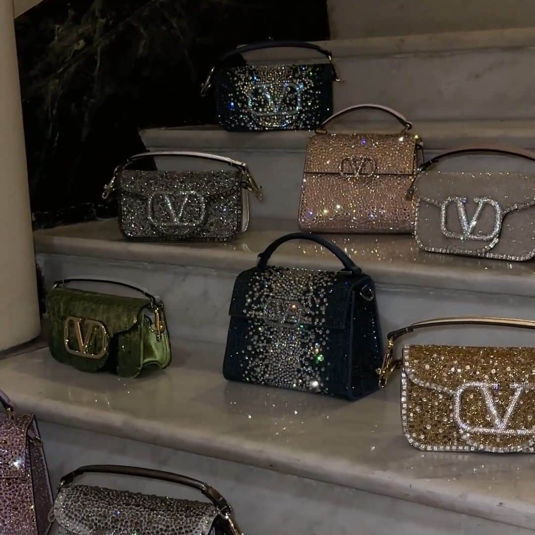 Harrodsのインスタグラム：「You bring the Champagne, we’ll bring the #VALENTINOGARAVANI. This scintillating array of bags gets the party started ✨  Find exclusive and new-season pieces in Luxury Accessories on the Ground Floor and in Womenswear on the First Floor, with selected styles available at harrods.com.  #Harrods #HarrodsFashion」