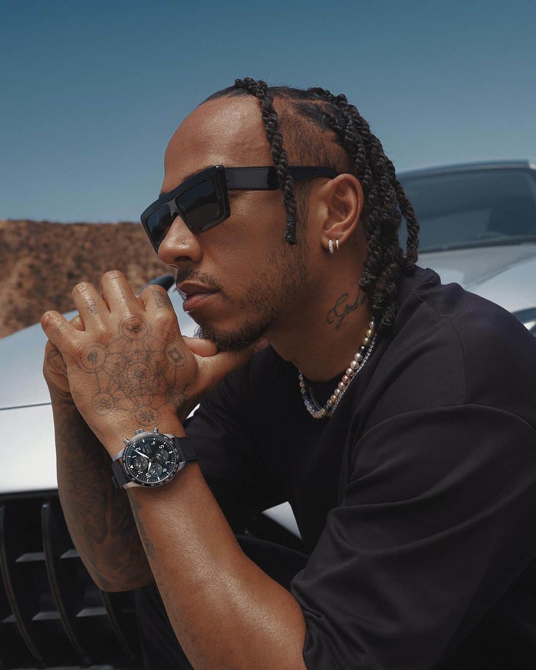 IWCのインスタグラム：「Engineered for performance.   The Pilot's Watch Performance Chronograph 41 AMG worn by @lewishamilton.  🔗Link in bio  #PerformanceChronograph I #AMGxIWC I #TheReference」
