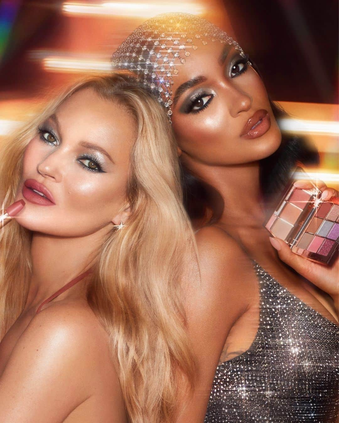 シャーロット・ティルベリーのインスタグラム：「💖 KATE MOSS + JOURDAN DUNN DAZZLE IN NEW! HOLIDAY BEAUTY SECRETS! 💖   Darlings, everyone is loving the BEAUTY EUPHORIA of my NEW! Holiday collection - my ICONIC friends and Beauty Muses @KateMossAgency and @JourdanDunn included!!! ✨ Inspired by Kate's rock star DNA and created in support of The Rocket Fund, powered by @ejaf, my NEW! Rocket Girl lipstick is the party nude you've all been waiting for! And I'm OBSESSED with Jourdan's magnetising PINK PLANET gaze, created using my NEW! Limited Edition Beautyverse Palette - it's the palette on everyone's wishlist this holiday season, darlings! 💖✨ Shop NEW! Magic Gifting Universe on CharlotteTilbury.com or on the app! 🪩💕   #CharlotteTilbury #ClubMagic #StepIntoMagic #CharlotteTilburyHoliday」