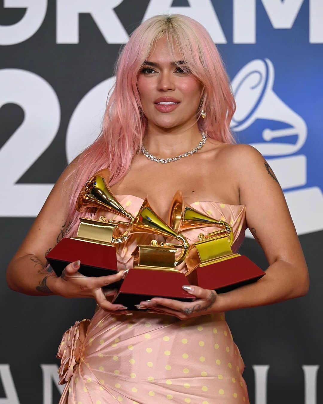 バルマンさんのインスタグラム写真 - (バルマンInstagram)「LATIN GRAMMYS Congratulations to @karolg for three wins at the @latingrammys last night in Sevilla. The singer illuminated the evening and the stage in a mesmerizing #BALMAINSS24 couture gown by @olivier_rousteing, evoking some iconic Balmain signatures, including the Pierre Balmain’s cherished polka dot and a sculptural rose detail pulled from the latest runway. #BALMAINARMY   Styled by @brettalannelson Photographed by @andresgarlujan」11月17日 19時56分 - balmain