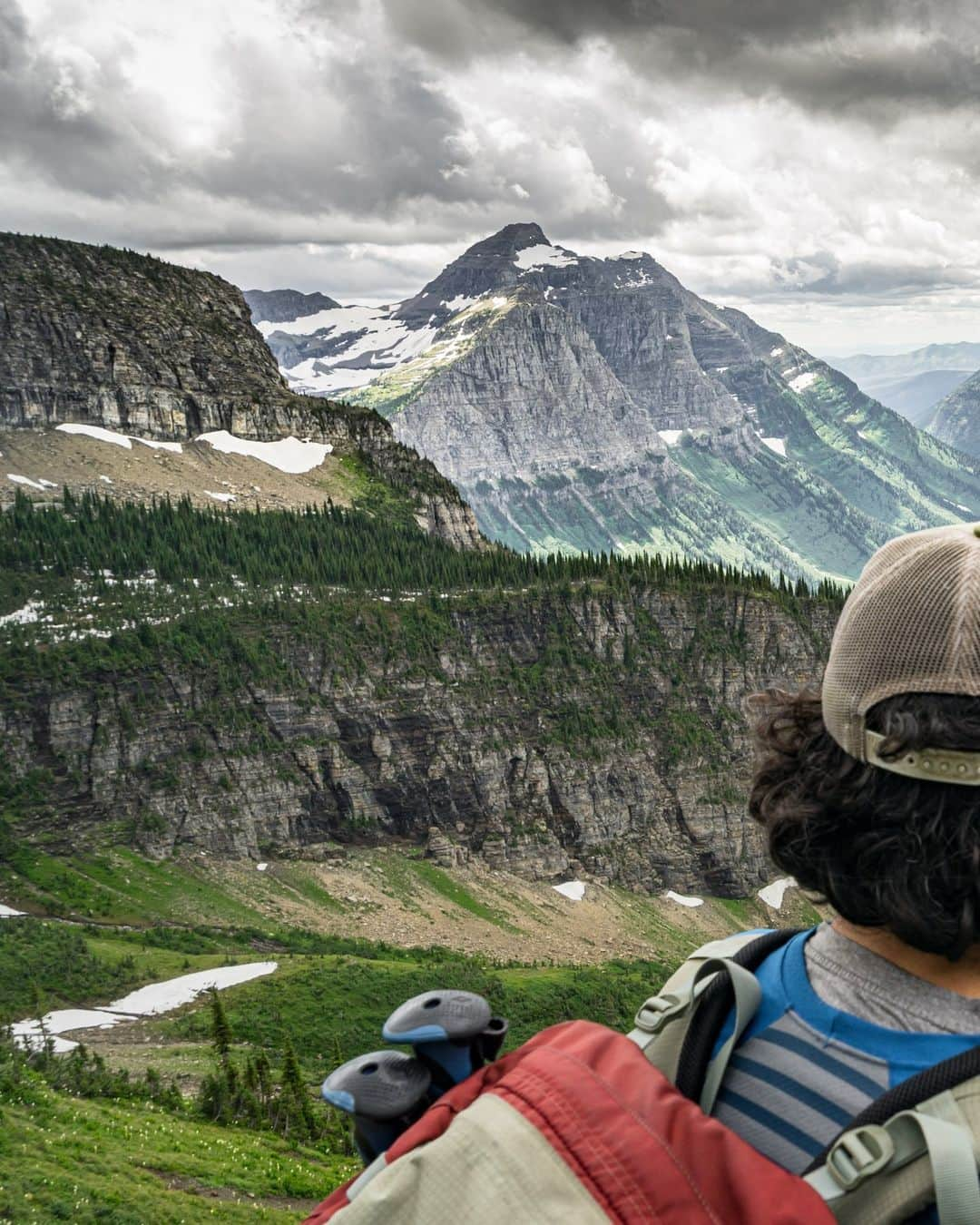 National Geographic Travelのインスタグラム：「Photo by Kris Graves @krisgraves | On this National Take a Hike Day, I'm reminiscing about the awe-inspiring journey my friend David guided me through in Glacier National Park. As we trekked through its breathtaking landscapes, I was reminded of the boundless beauty that exists beyond our everyday lives. It's a call to all to step outside, embrace the fresh air, and immerse ourselves in the wonders of the natural world. So, let's lace up our hiking boots, get out there, and see something new, for the great outdoors has endless adventures waiting for us to discover. #NationalTakeAHikeDay #TakeAHikeDay   To see more of my work, please visit @krisgraves」