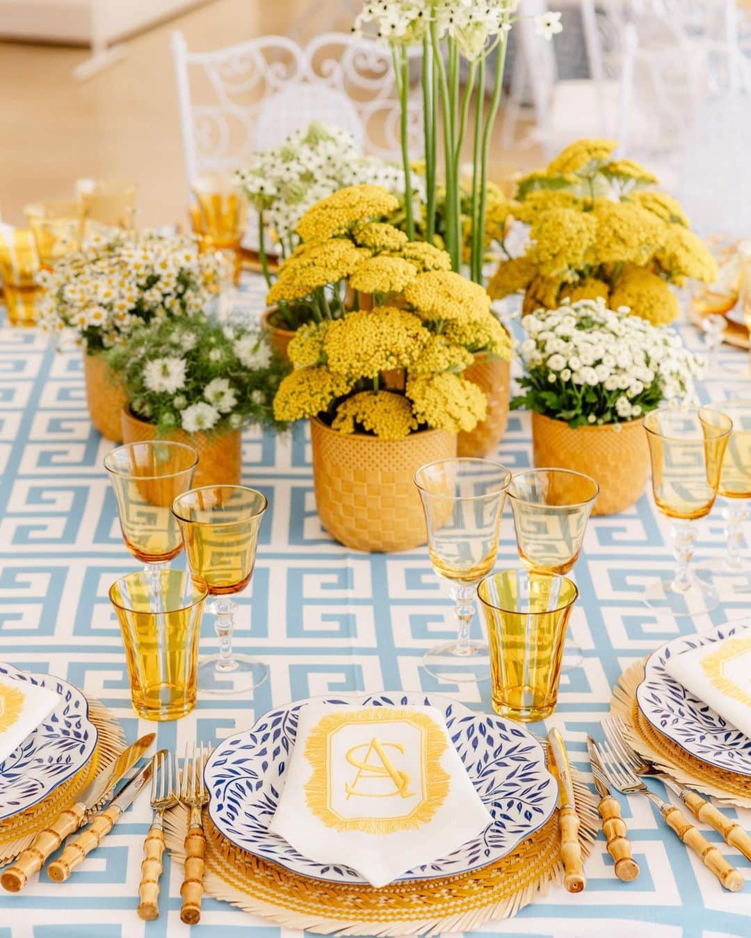 Ceci Johnsonのインスタグラム：「WEDDING | S&A’s celebration concluded with a delightful poolside brunch. Drawing inspiration from the charming yellow and white stripe parasols showcased on page 3 of the book invitation, we enhanced the design using gold foil stripes. To complement the theme, we crafted matching signage and napkins featuring an embroidered monogram in vibrant yellow designed by our team. #CeciCouture ⠀⠀⠀⠀⠀⠀⠀⠀⠀ CREATIVE PARTNERS: Luxury Invitation & Event Branding: @cecinewyork Planning & Design: @lavenderandroseweddings Venue & Catering:  @fscapferrat Photography: @daniloandsharon Videography: @chromata_films_weddings Production: @deco_flamme Tableware: @maisonmargauxltd @maison_options Floral Design: @roni_floral_design Music: @troubadoursriviera @rozgajelenaofficial Entertainment: @prodiammclescure ⠀⠀⠀⠀⠀⠀⠀⠀⠀ #cecinewyork #ceciwedding #luxuryinvitations #elegantdesigns #coutureinvites #opulentdetails #bespokeinvitations #ccelebrations #artistryinvitations #highenddesigns #luxurystationery #premiuminvitations #exquisitedetails #invitationelegance #celebrateinstyle #glamorousinvites #luxurycelebrations #finestationery #customizedelegance #celebrationperfection #invitationcouture #elevateyourevent #luxuryeventplanning」