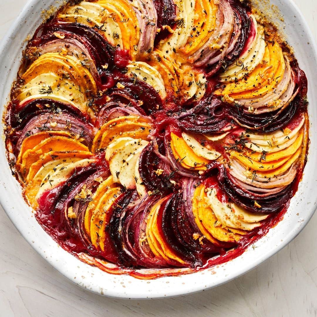 Food & Wineのインスタグラム：「This Root Vegetable Tian is as delightful to eat as it is to look at. Brighten up your Thanksgiving spread with this stunner, at the link in bio.   🍠: @susanspungen, 📸: @gregdupree」