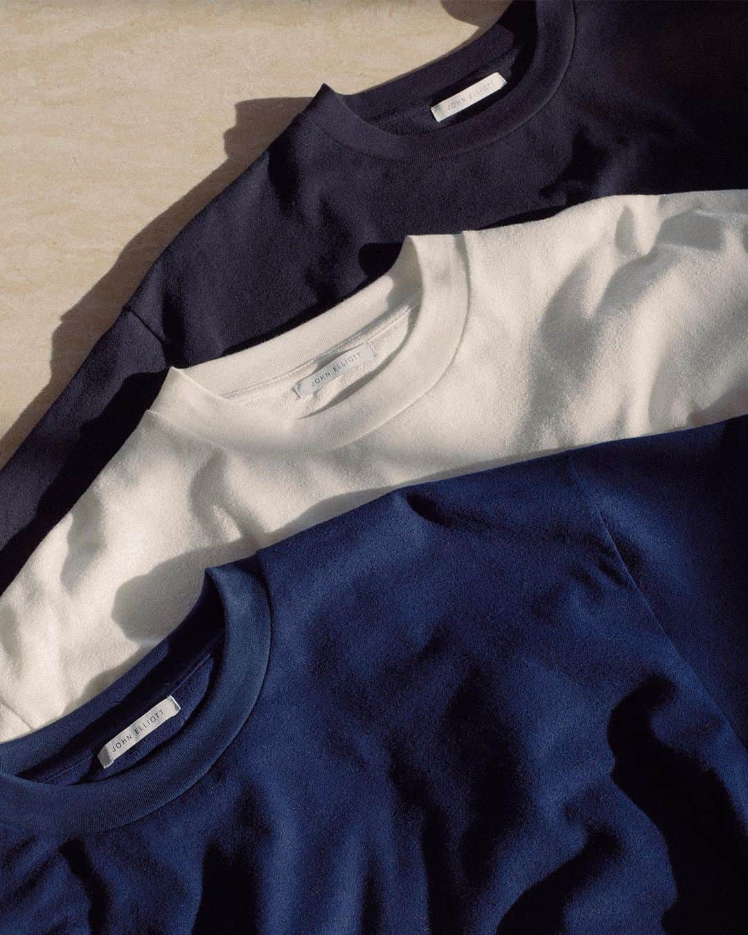 ジョン エリオットのインスタグラム：「"Available Now at 40% Off—New Exclusive Boucle Tees and Nylon Trek Utility Cargos. Link in stories and bio.  The relaxed fit University silhouette is fashioned in custom-knit baby boucle fabric. This unique, lightweight material is characterized by a crepe texture. Alongside tees, the 'Utility Cargo Pant' is re-envisioned in cotton / nylon fabric, popularized on our 'Himalayan' styles. The material is durable and sporty with a distinctive dry hand."」