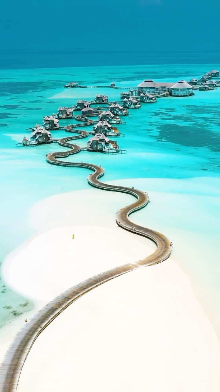 BEAUTIFUL DESTINATIONSのインスタグラム：「Lost in the magic of the Maldives with @ishotmaldives! 🌊 This drone-captured video of Soneva Jani feels like stepping into a surreal world—endless blue waters and a winding path to hotel rooms that’s an invitation to serenity. 💆  📽 @ishotmaldives 📍 Soneva Jani, Maldives 🎶 sheisthelostgirl - One day you’ll visit places you thought could only」