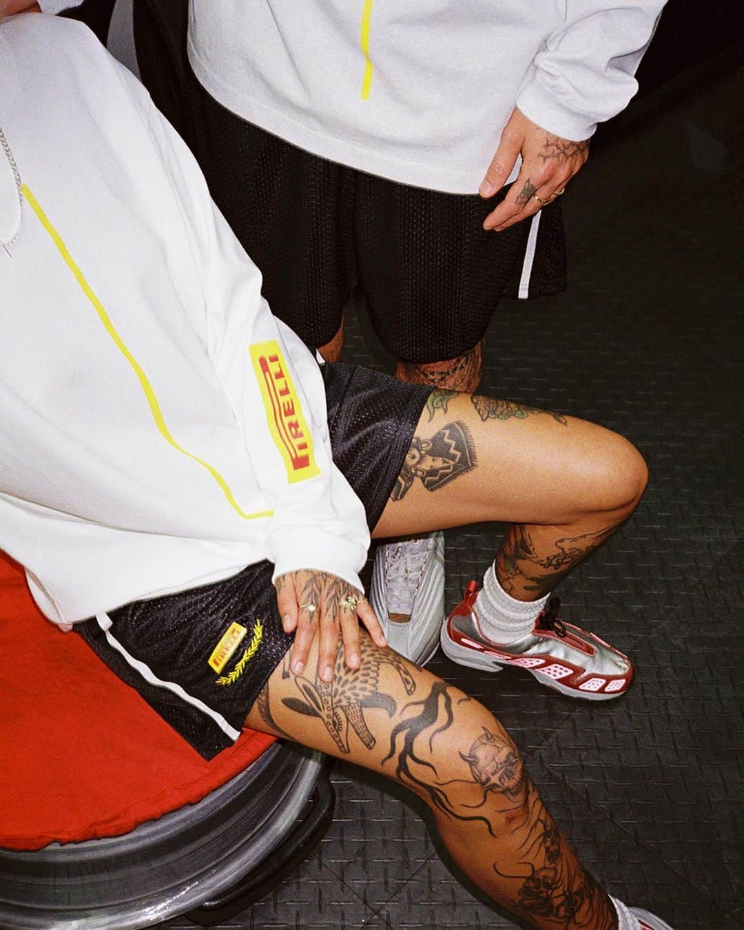 Flight Clubのインスタグラム：「Lights Out. Shop our racing-inspired collaboration with acclaimed tire manufacturer Pirelli. The limited-edition drop features premium Long Sleeve Tees, a Mesh Short and Racing Cap, finished with custom gold leaf embroidery and signature Pirelli branding. Made in Japan. Available online now.」