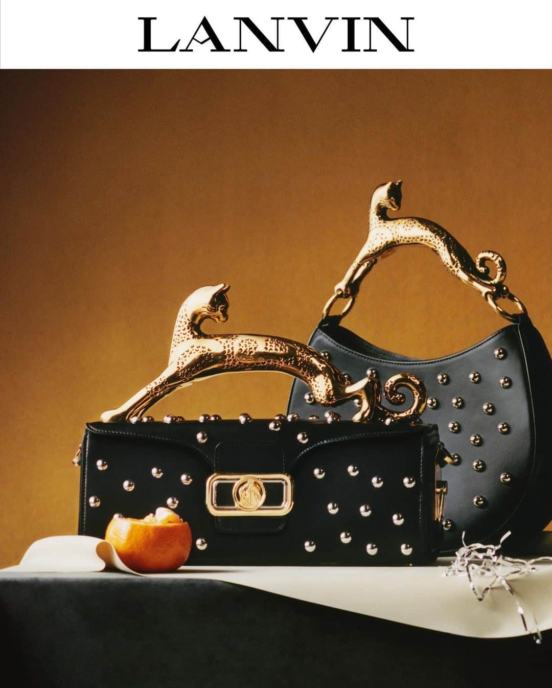 ランバンのインスタグラム：「LANVIN Holiday 2023: Light, shadow, magic   Discover the iconic Cat bag, Curb sneaker and other LANVIN accessories embellished with carefully placed polka-dot studs.   #LANVINHOLIDAY2023 #LANVIN」