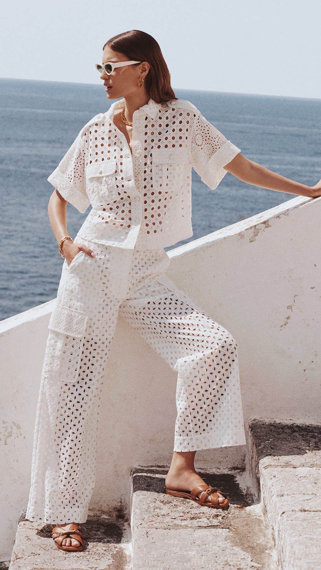 のインスタグラム：「Seaside Sets: From Resort 24, the Matchmaker Anglaise Shirt and Pant, styled with the Zimmermann Echo Cat Eye and Prisma Slide. #ZimResort24 #zimmermann」