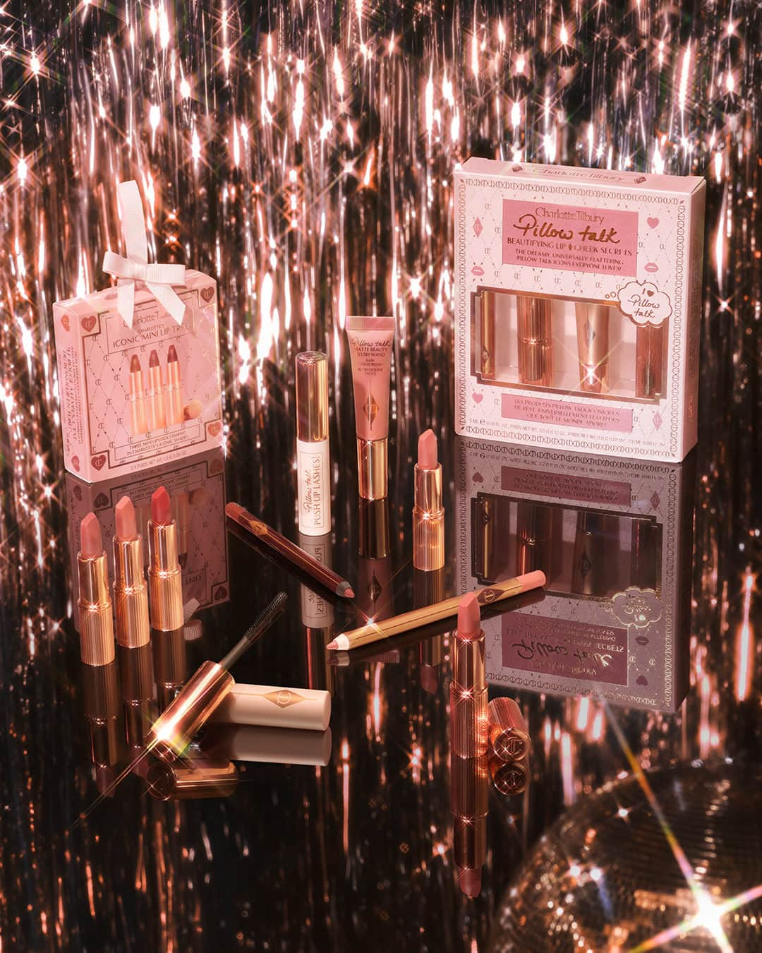 シャーロット・ティルベリーのインスタグラム：「💖 MAKE THEIR PILLOW TALK DREAMS COME TRUE! 💖  Darlings, Pillow Talk is ALWAYS a good idea!!! My UNIVERSALLY BEAUTIFYING collection is packed with PERFECT GIFTS, from MAGIC MINIS for Secret Santas to TREASURE TROVES for the ones you love most!! 💫 And darlings, this is not a drill 🚨 - you can unlock FREE PILLOW TALK GIFTS* for you and your loved ones when you shop my BLACK FRIDAY BEAUTY WARM-UP online NOW!! ✨💗  Tap to shop! 🌟  *T&Cs apply.  #CharlotteTilbury #StepIntoMagic #CharlotteTilburyHoliday #PillowTalk」