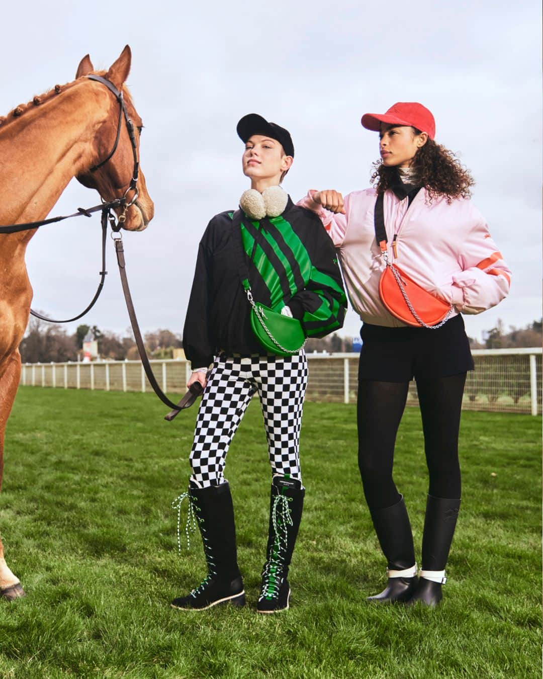 Longchampのインスタグラム：「Girls weekend gateway ideas?  Collection : #LongchampFW23 Bag : #LongchampSmile   Photographer : Guillaume Sanner Models : @mariebelleworlds @zoethaets Hair : Pierre Saint-Sever Make-up : Hélène Vasnier  #LongchampAtTheRaces #LongchampFW23 #longchamp #cozy #mood #frenchy #hippodrome #closeup #smilebag #greenbag #orangebag #crossbodybag #leatherbag」