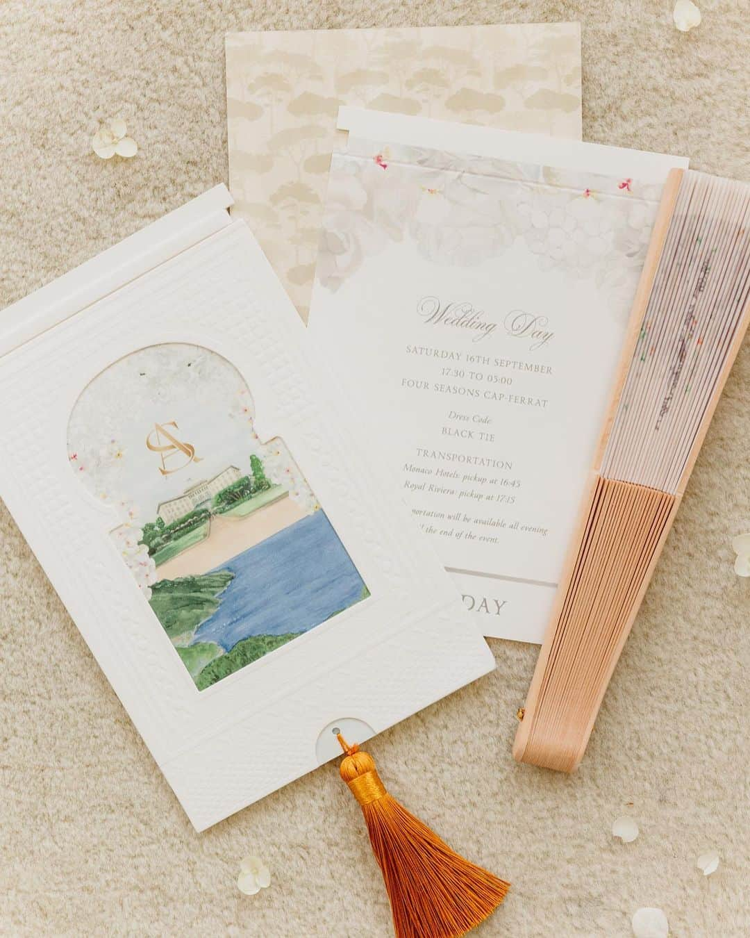 Ceci Johnsonさんのインスタグラム写真 - (Ceci JohnsonInstagram)「WEDDING | Presenting a closer look at this couture invitation inspired by the Four Seasons Cap-Ferrat, France –S&A’s wedding venue. Outside, the box is hand wrapped in neutral linen, opening to reveal a book invitation that invites guests on a journey to celebrate their love. The book’s cover features a hand painted 3D watercolor art depiction of their wedding venue. Each page inside is a canvas inspired by the locations of their welcome party at @yachtclubmonaco, white-orchid wedding, and poolside brunch at @fscapferrat. To complement this couture experience, a matching welcome booklet has been crafted, incorporating a tassel for an added touch of refinement.  #CeciCouture ⠀⠀⠀⠀⠀⠀⠀⠀⠀ CREATIVE PARTNERS: Luxury Invitation & Event Branding: @cecinewyork Planning & Design: @lavenderandroseweddings Welcome Party Venue & Catering: @yachtclubmonaco Wedding Venue & Catering:  @fscapferrat Photography: @daniloandsharon ⠀⠀⠀⠀⠀⠀⠀⠀⠀ #cecinewyork #ceciwedding #lavenderandroseweddings #luxuryinvitations #elegantdesigns #coutureinvites #opulentdetails #bespokeinvitations #chiccelebrations #artistryininvitations #highenddesigns #luxurystationery #premiuminvitations #exquisitedetails #invitationelegance #celebrateinstyle #glamorousinvites #luxurycelebrations #finestationery #customizedelegance #celebrationperfection #invitationcouture #elevateyourevent #luxuryeventplanning」11月18日 23時49分 - cecinewyork