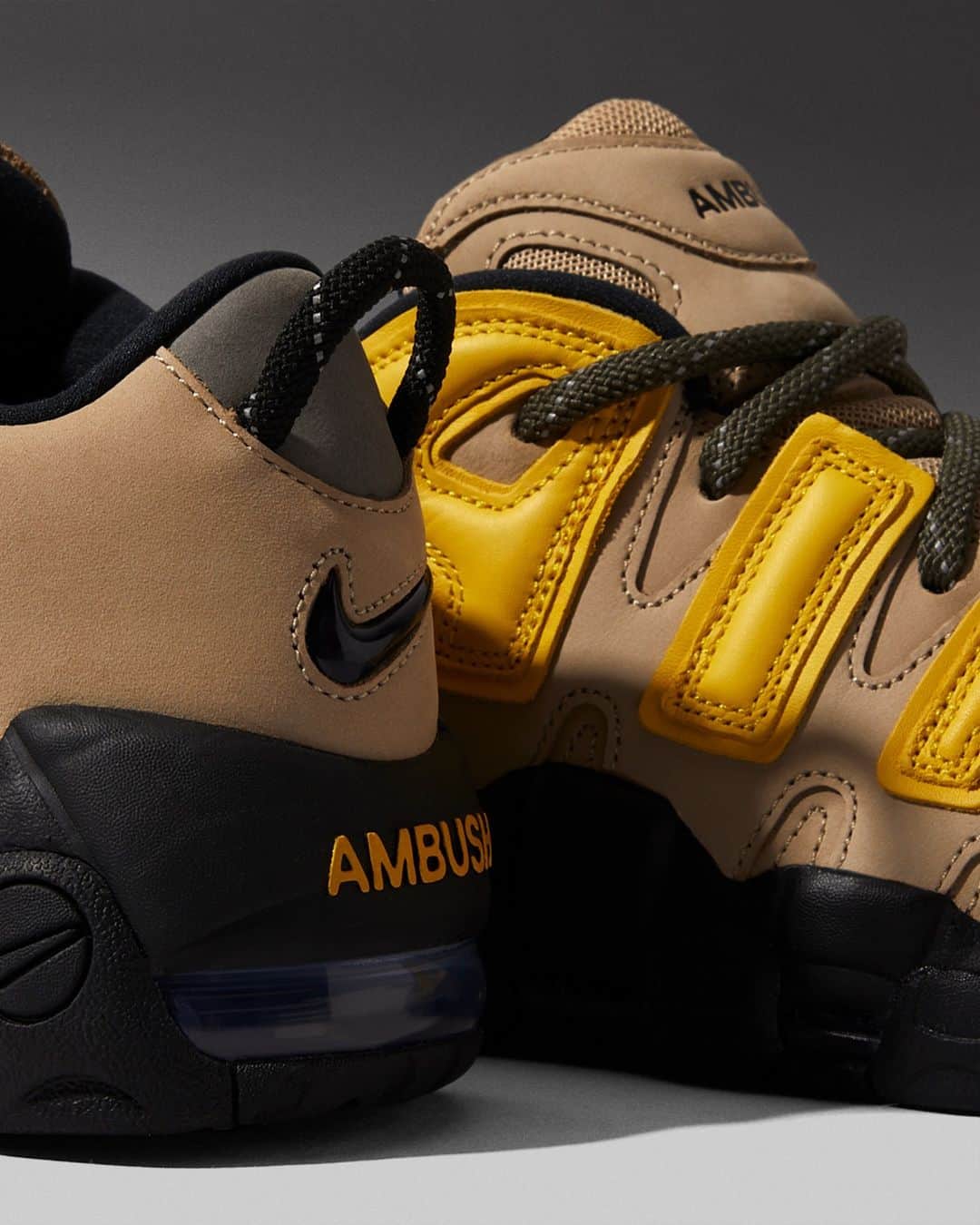 Flight Clubのインスタグラム：「Arriving at the hands of Tokyo-based fashion designer Yoon Ahn, the AMBUSH x Air More Uptempo Low 'Limestone' flips the vintage hoops silhouette with skate-inspired elements from the early 2000s. Ahn's surgical reconstruction showcases a beige nubuck upper, chunky blacked-out midsole and striking 'AIR' lettering in Vivid Sulfur.」