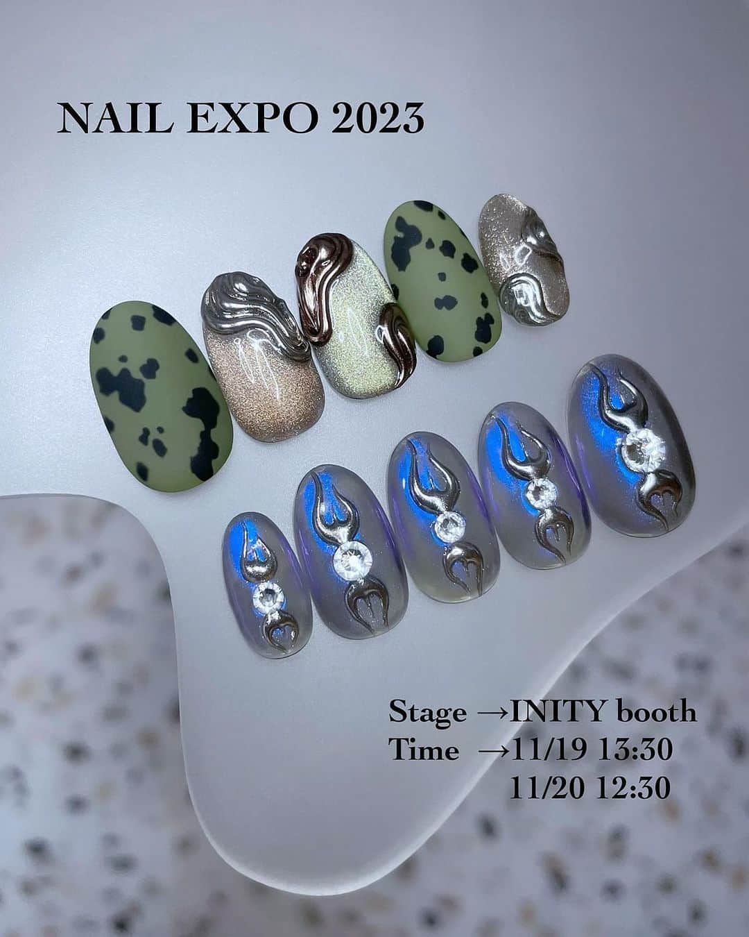 KAI32のインスタグラム：「. NAIL EXPO 2023🪵🍂  @initygel_official  11月19日・20日の2日間INITYブースにてデモンストレーションをさせて頂きます！  ⏬スケジュール 11月19日  13:30〜14:15 マグネットジェルを使用したメタリックニュアンスアート🎨  11月20日  12:30〜13:15 メタリックトライバルをあしらったY3Kアート⛓️✔️  NAIL EXPOにご来場のお客様はお時間ありましたら是非ブースにお立ち寄りください😛💫 お待ちしております🫶🏻  📍INITYブース 東京ビックサイト【東5ホール D-024】 . . #pinkrosewindow #pink_rose_window  #inity  #initygel #toysbyinity #kittybit」