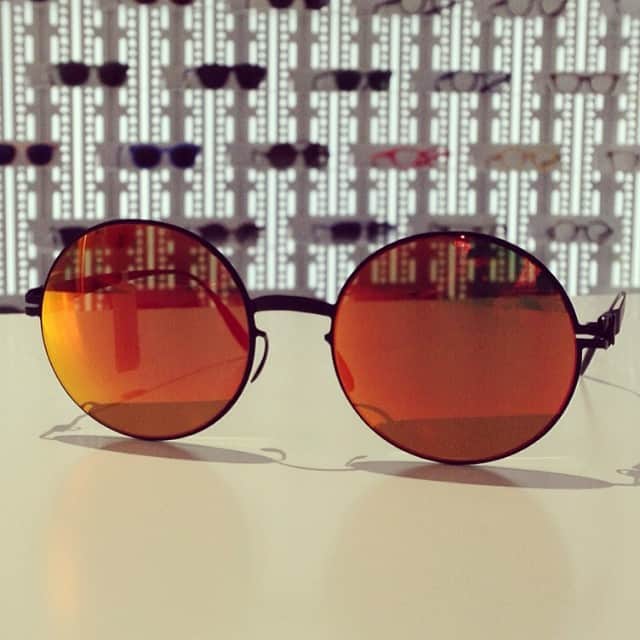 のインスタグラム：「"JANIS black / orange flash lenses" in shop again. "MYKITA + Bernhard Willhelm"のコラボレーションサングラス"JANIS black "が再入荷致しました。 今回は希少な"orange flash"レンズでの納品です！ #MYKITA #マイキータ #eyewear #sunglasses #サングラス #fashion #collaboration #bernhardwillhelm #zeiss #orange #flash #black #round #verbal」
